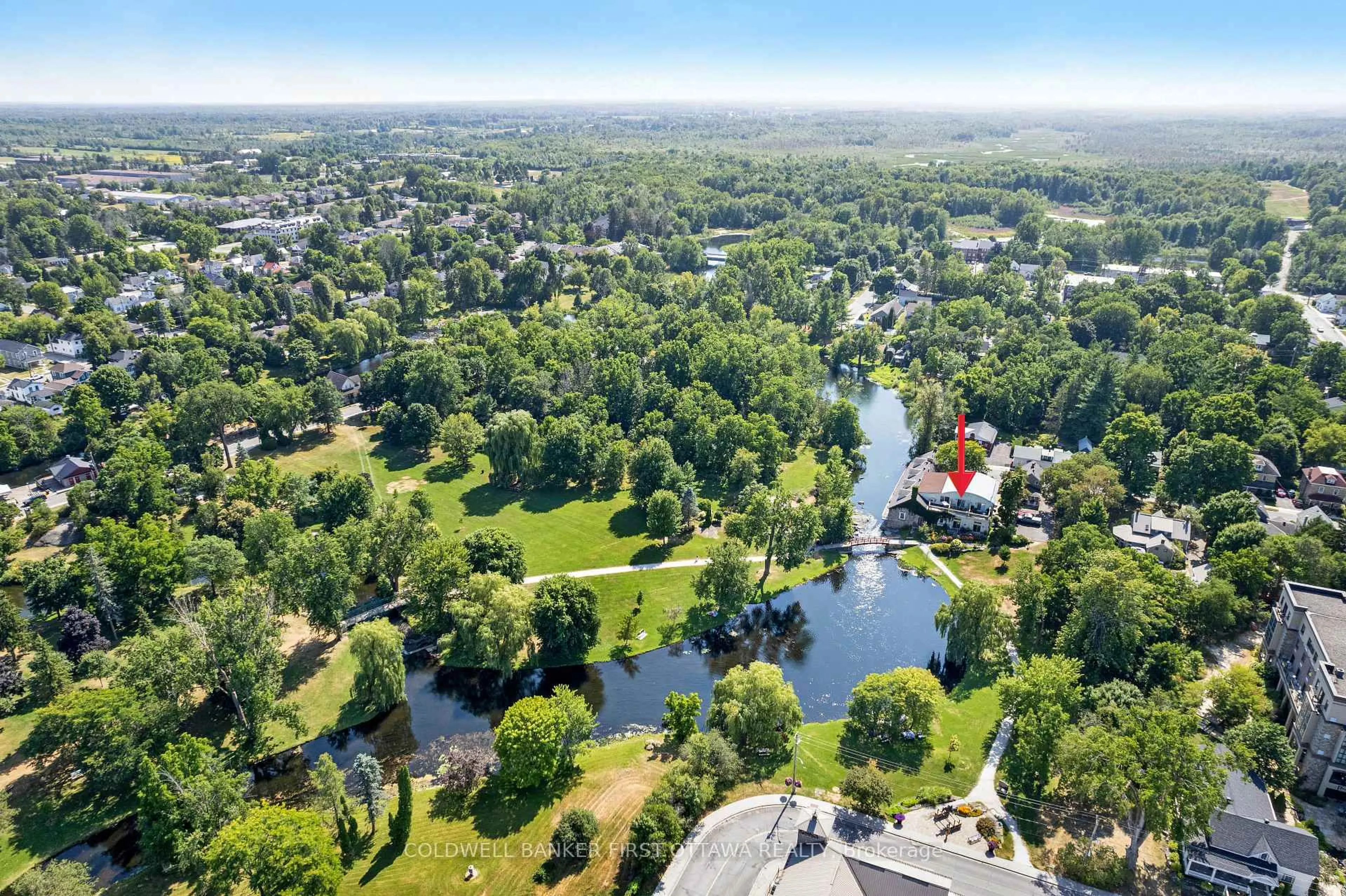 A pic from outside/outdoor area/front of a property/back of a property/a pic from drone, water/lake/river/ocean view for 7A Lewis St, Perth Ontario K7H 1M6