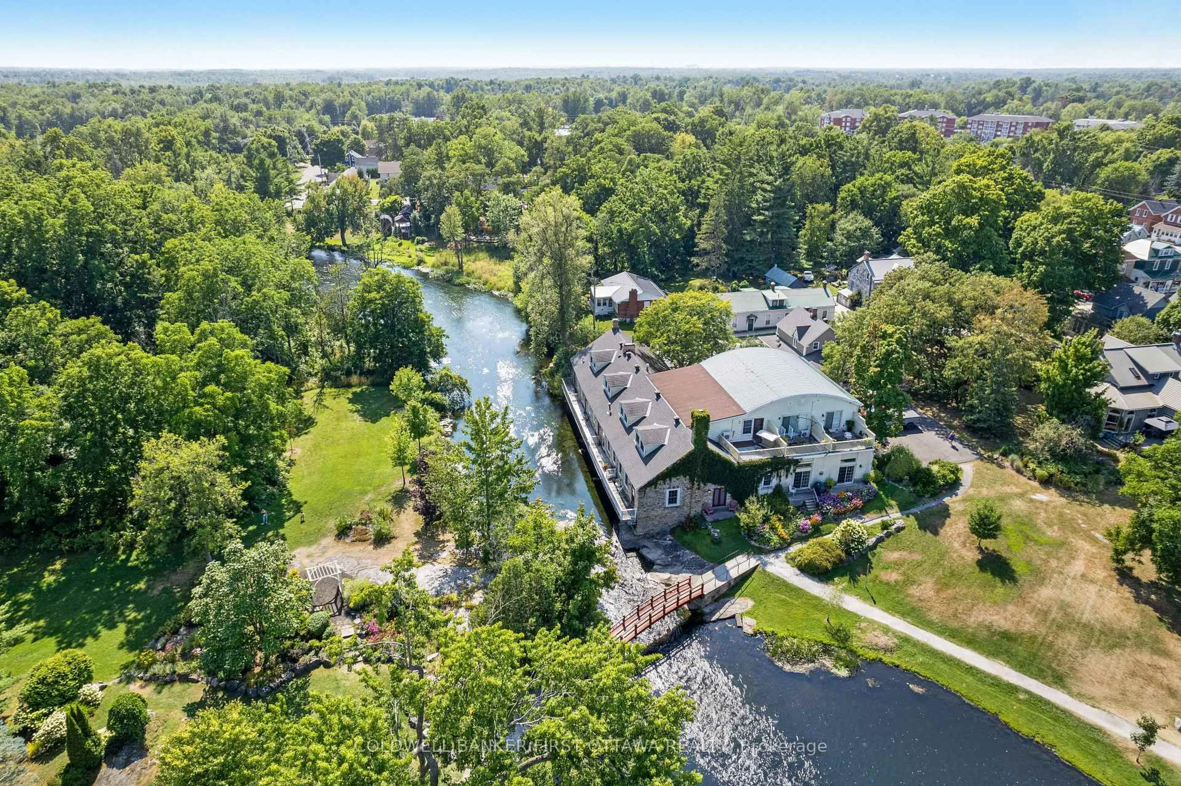 A pic from outside/outdoor area/front of a property/back of a property/a pic from drone, water/lake/river/ocean view for 7A Lewis St, Perth Ontario K7H 1M6