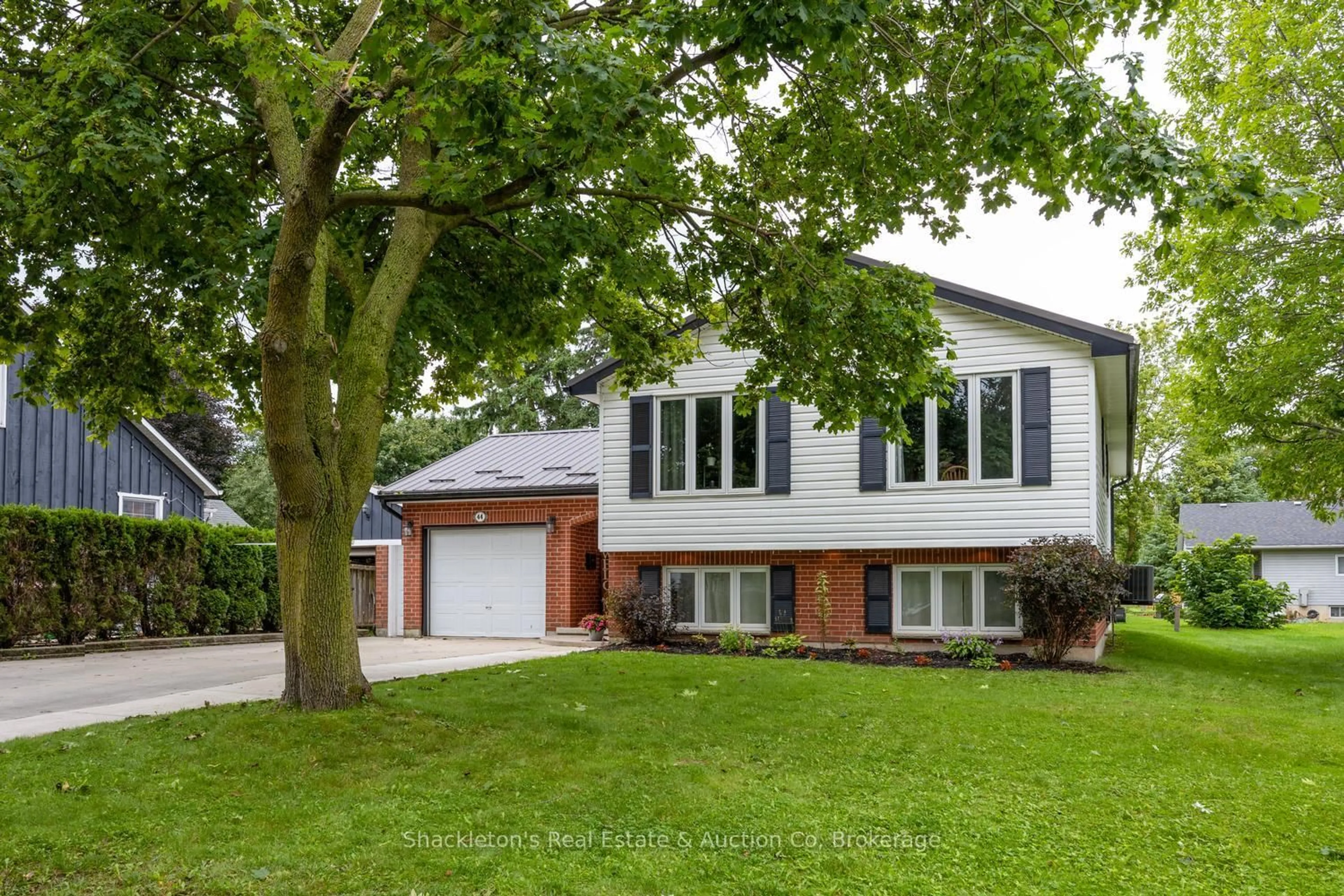 Home with vinyl exterior material, street for 44 Blenheim St, West Perth Ontario N0K 1N0