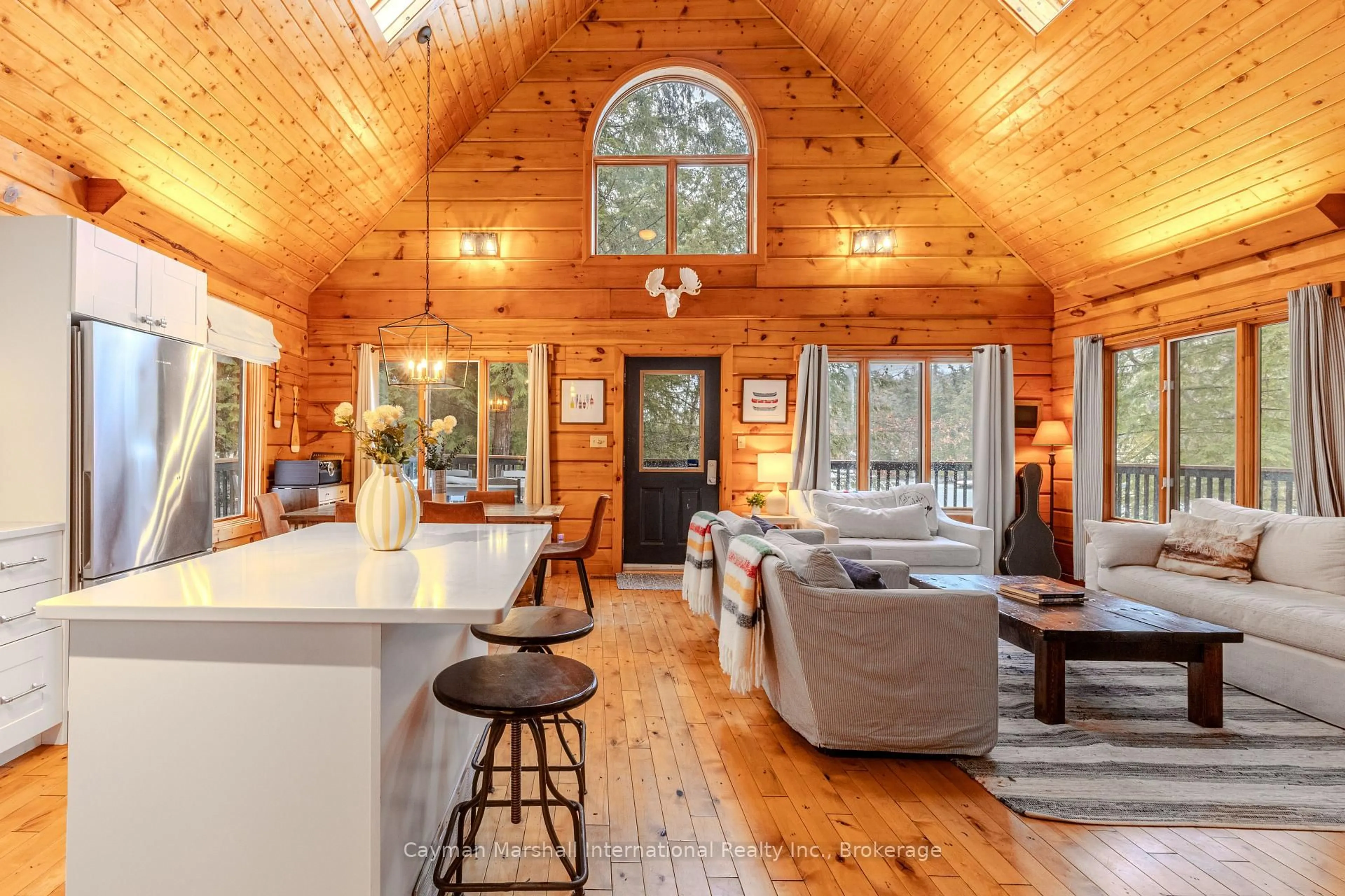 Open concept kitchen, wood/laminate floor for 1186 Ashforth Dr, Muskoka Lakes Ontario P0C 1M0