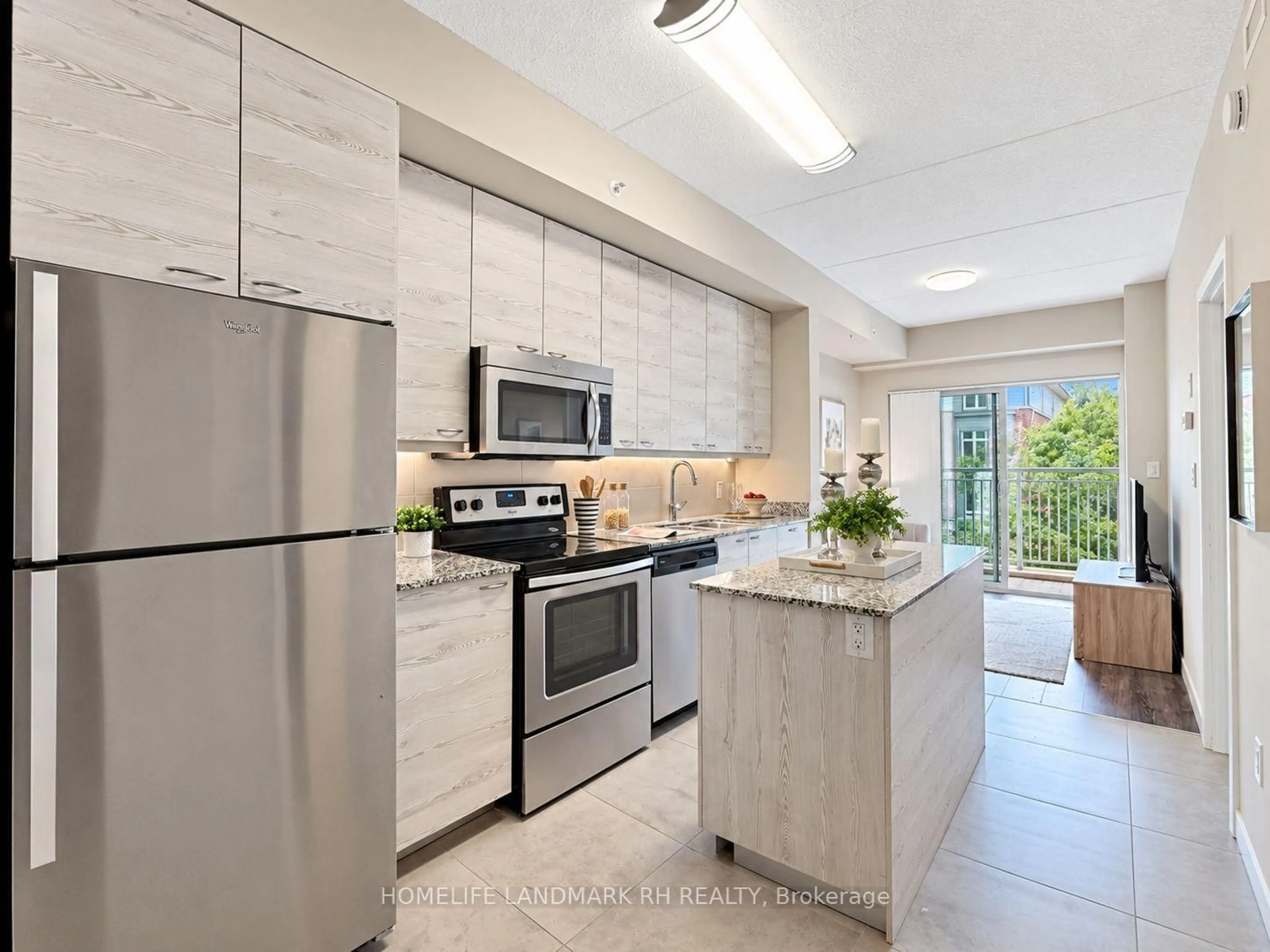 Open concept kitchen, ceramic/tile floor for 280 Lester St #210, Waterloo Ontario N2L 0G2