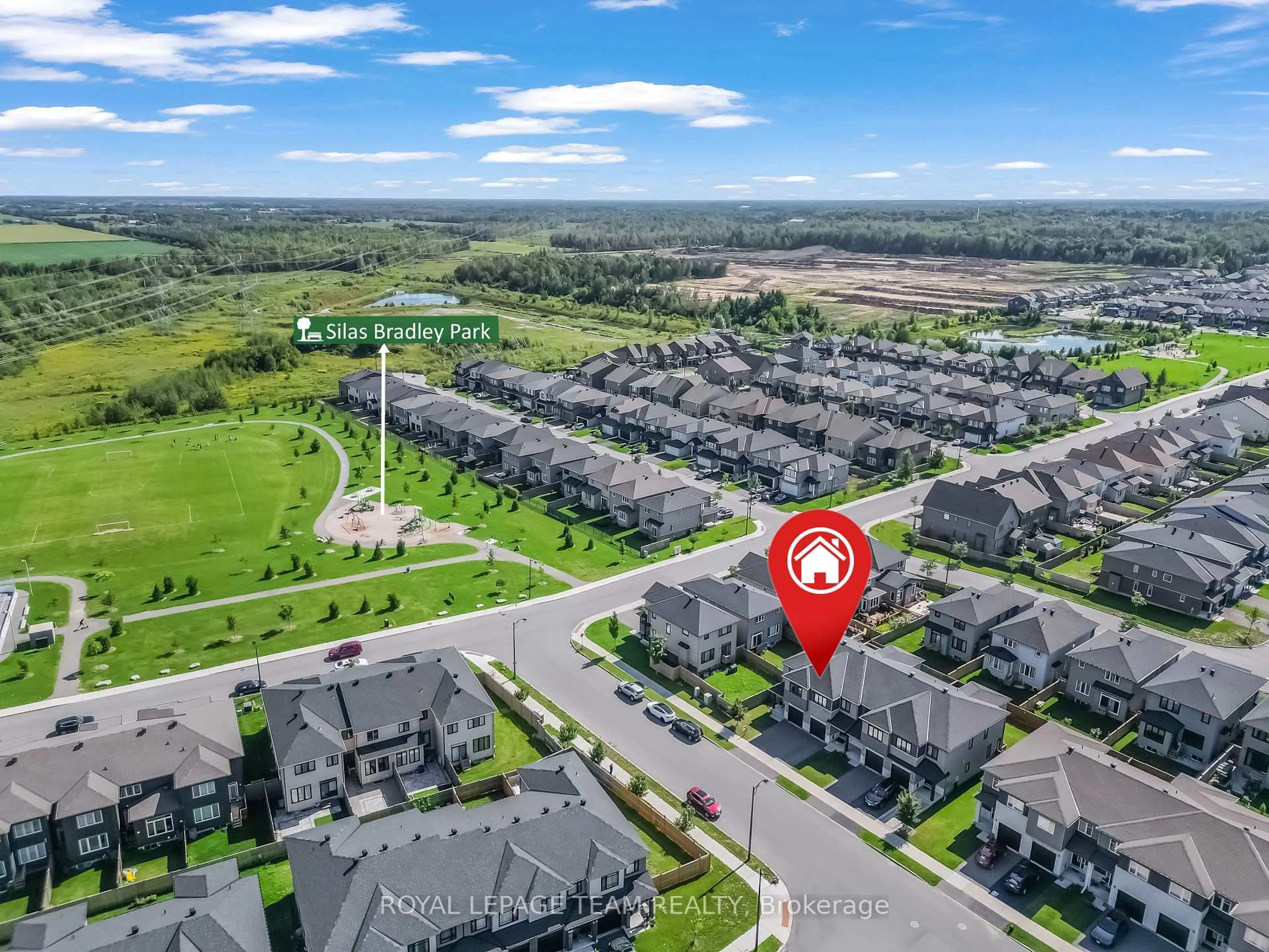 A pic from outside/outdoor area/front of a property/back of a property/a pic from drone, street for 607 Edenwylde Dr, Stittsville Ontario K2S 2L1