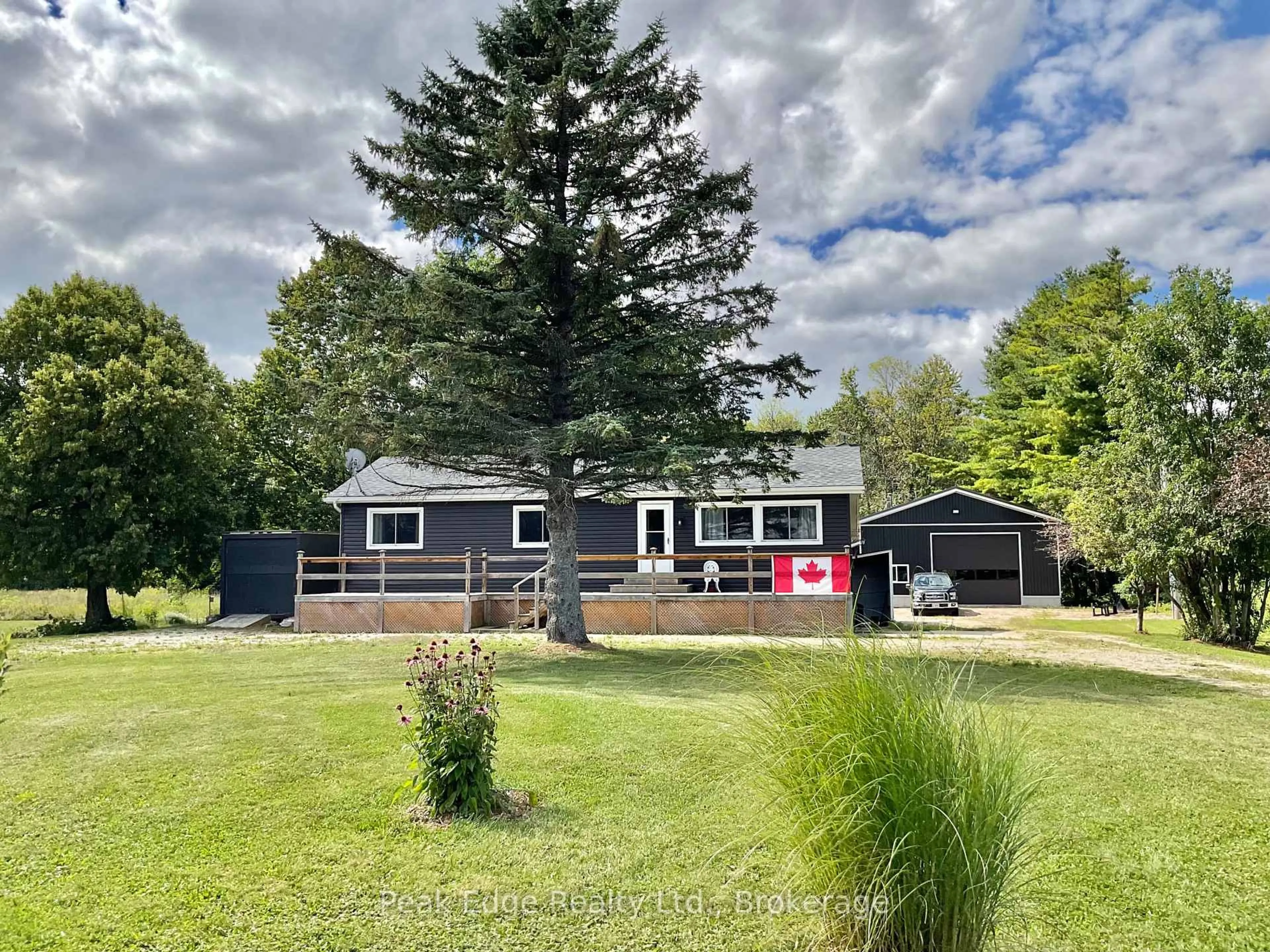 A pic from outside/outdoor area/front of a property/back of a property/a pic from drone, street for 887 Bruce Road 20 Rd, Brockton Ontario N0G 1J0