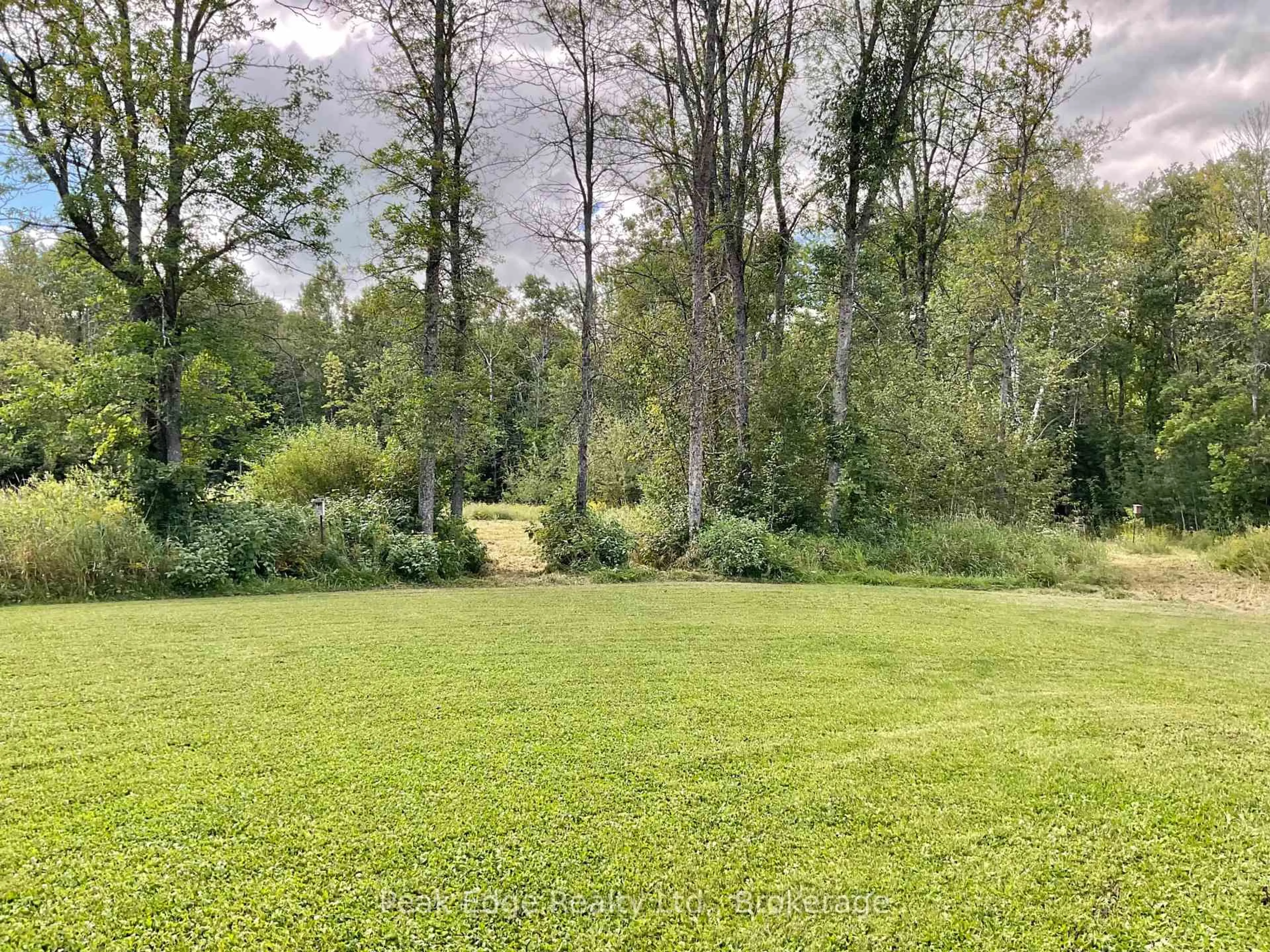 A pic from outside/outdoor area/front of a property/back of a property/a pic from drone, forest/trees view for 887 Bruce Road 20 Rd, Brockton Ontario N0G 1J0