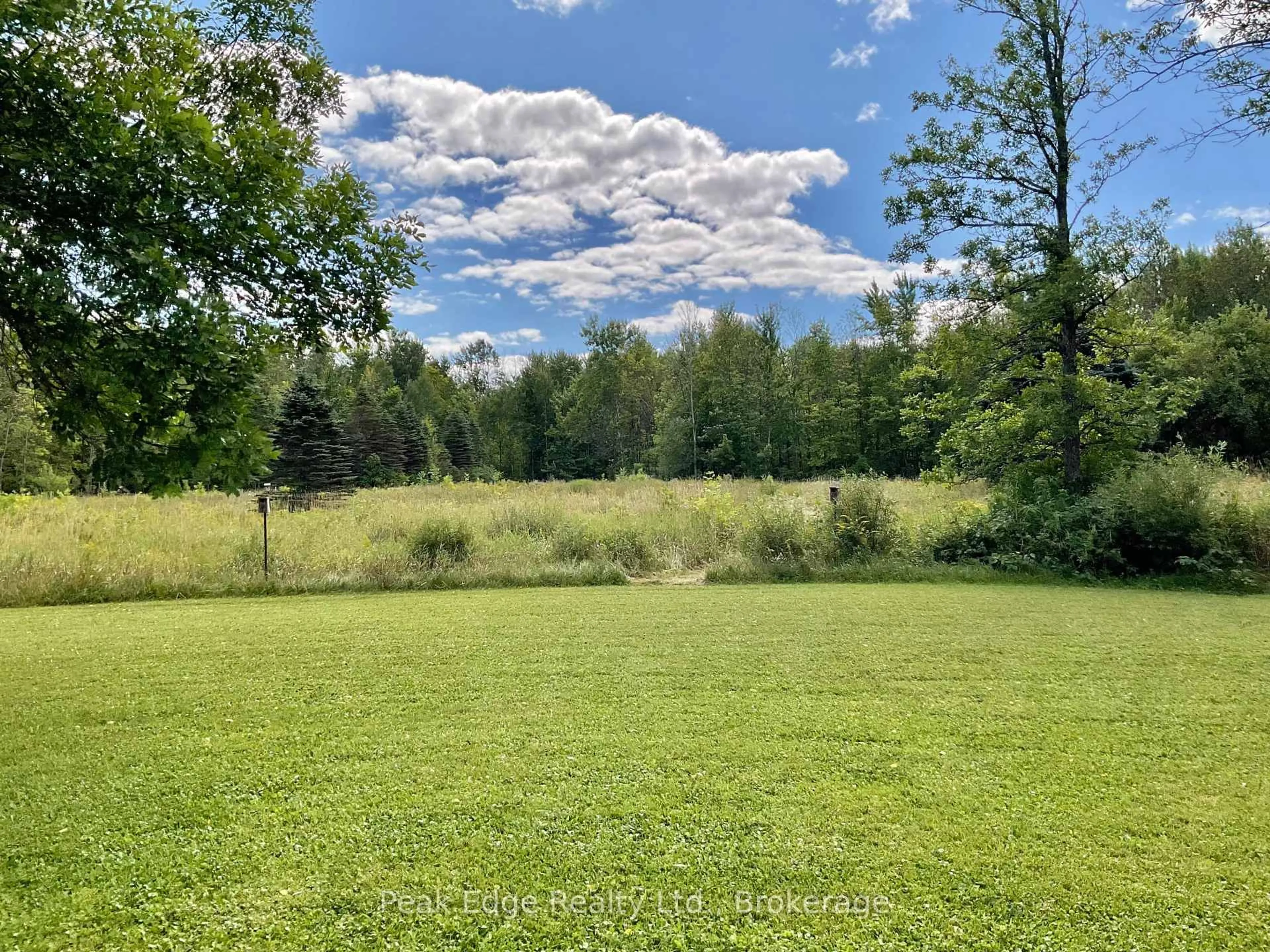 A pic from outside/outdoor area/front of a property/back of a property/a pic from drone, forest/trees view for 887 Bruce Road 20 Rd, Brockton Ontario N0G 1J0