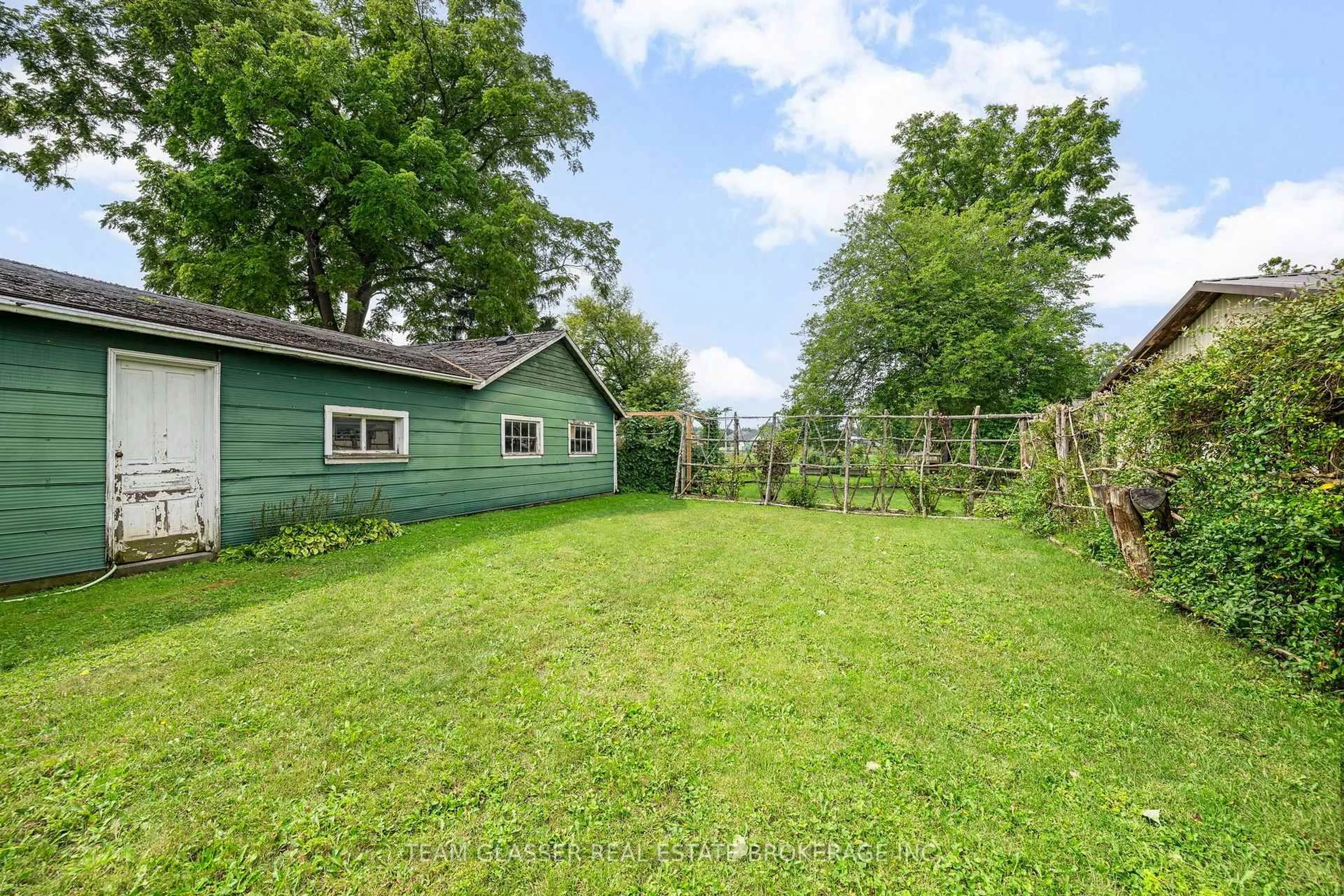 A pic from outside/outdoor area/front of a property/back of a property/a pic from drone, unknown for 151 MAIN St, North Middlesex Ontario N0M 2K0