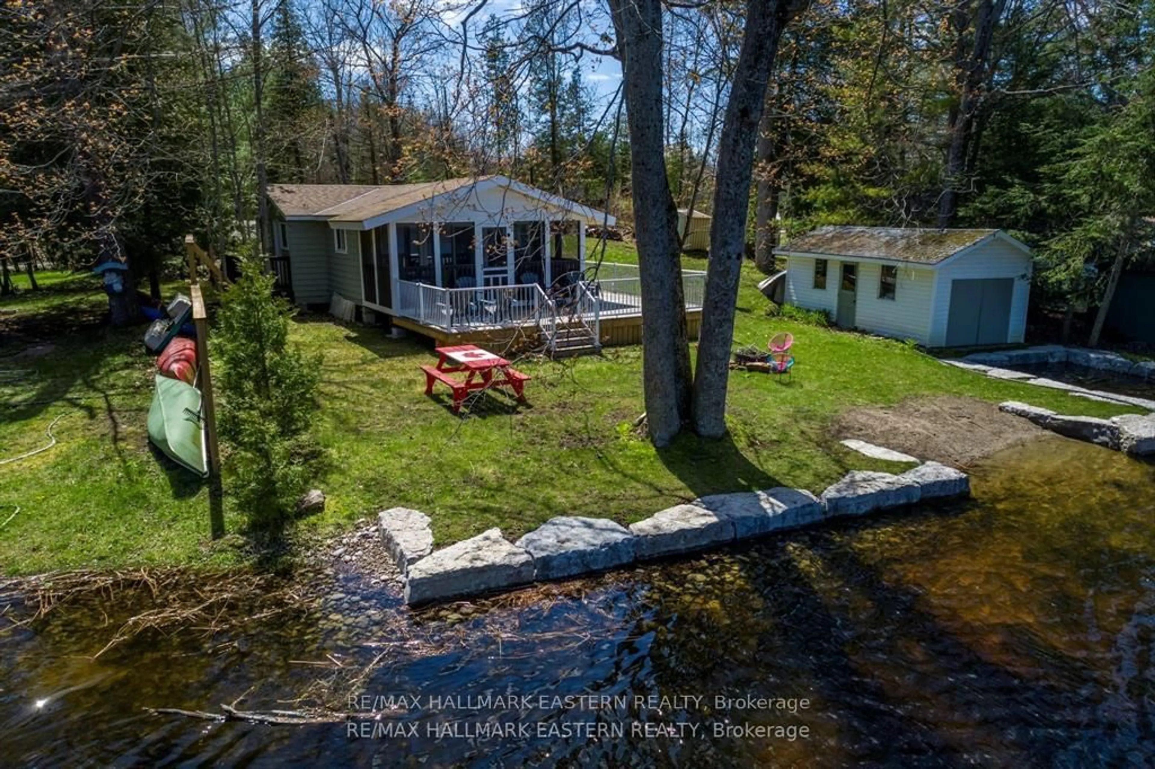 A pic from outside/outdoor area/front of a property/back of a property/a pic from drone, water/lake/river/ocean view for 1810 Hull Rd, Douro-Dummer Ontario K0L 2H0