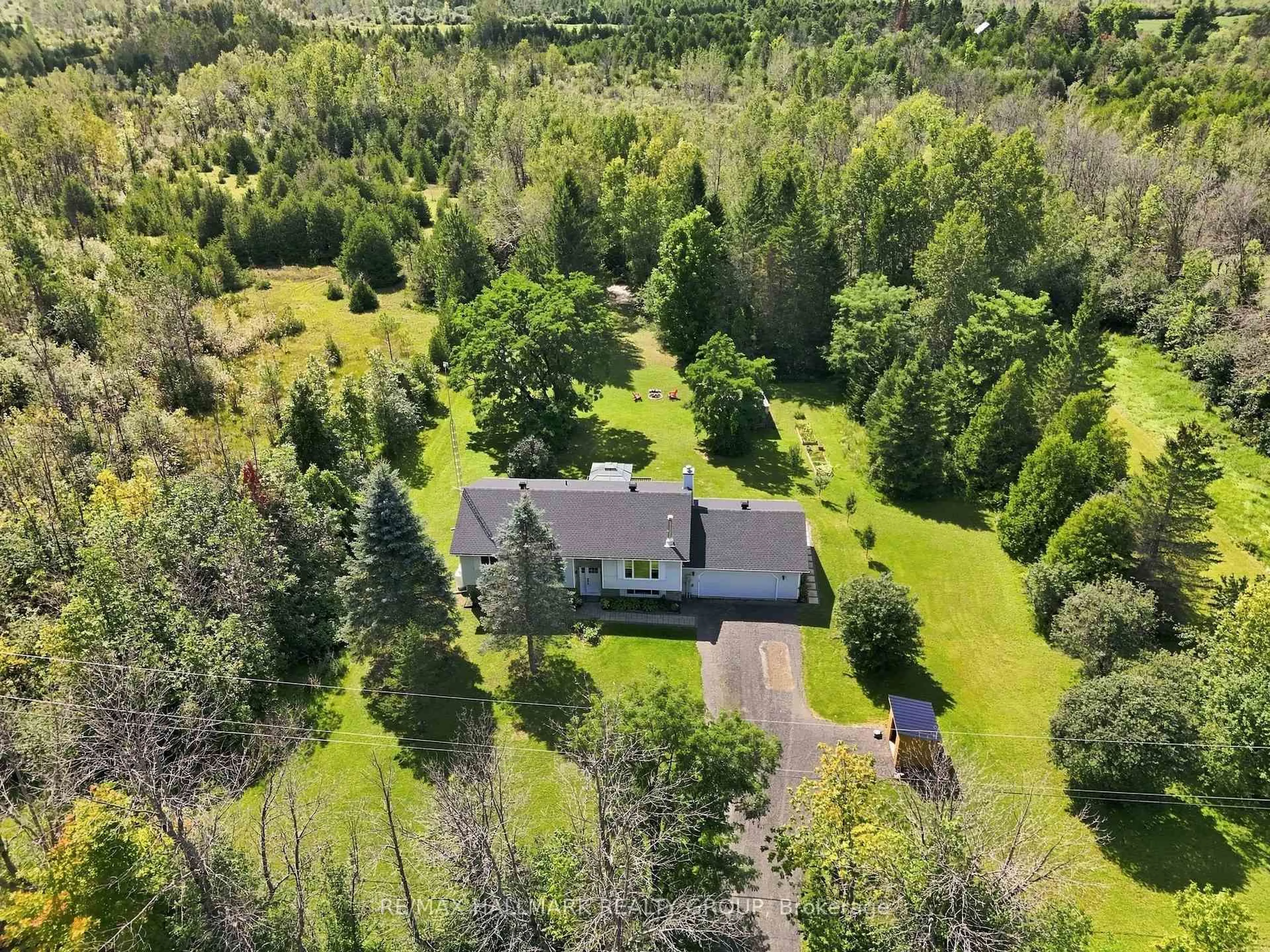 A pic from outside/outdoor area/front of a property/back of a property/a pic from drone, forest/trees view for 776 MCFARLANE Rd, North Grenville Ontario K0G 1S0