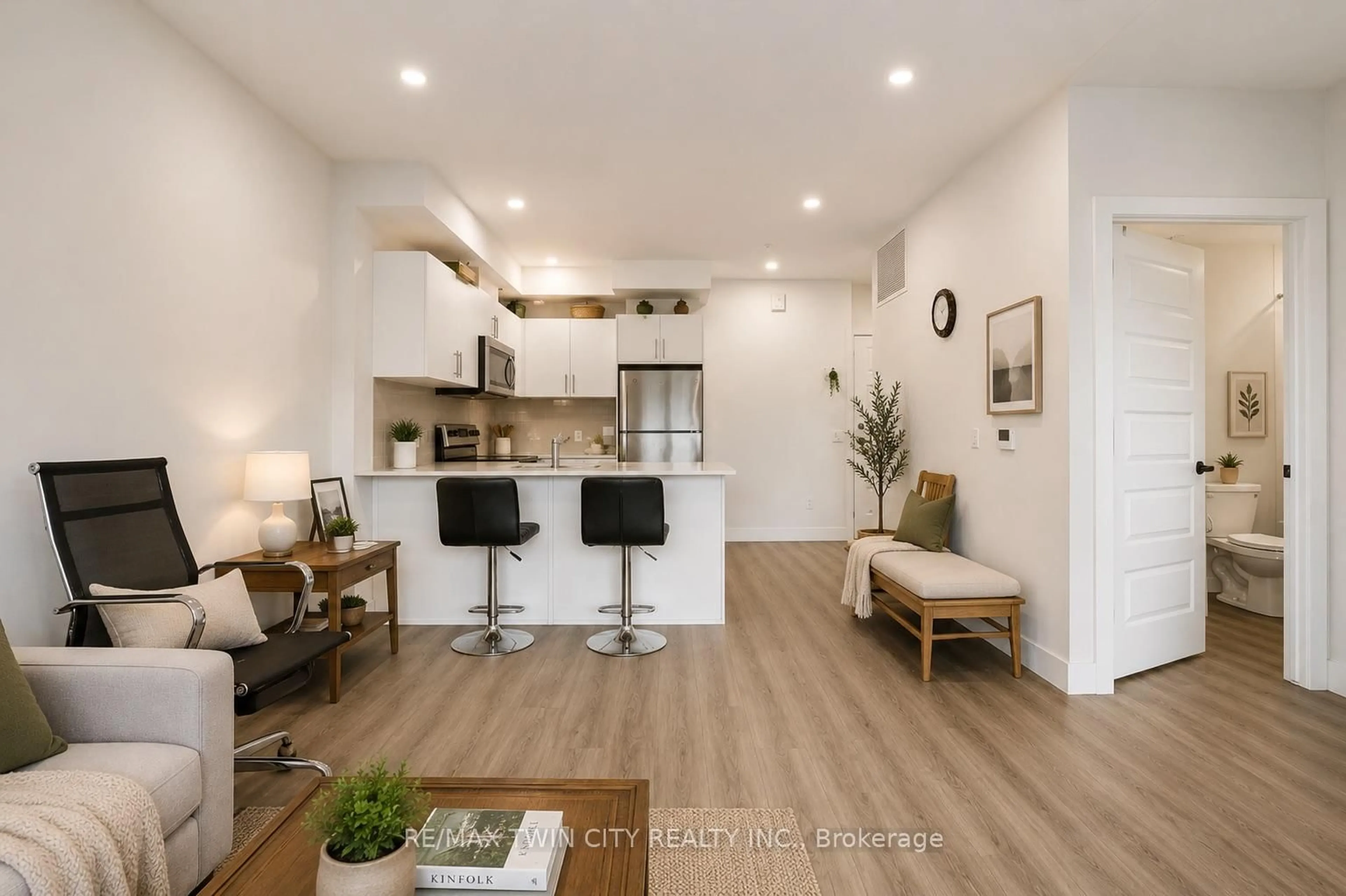 Living room with furniture, wood/laminate floor for 1000 Lackner Blvd #507, Kitchener Ontario N2A 0L9