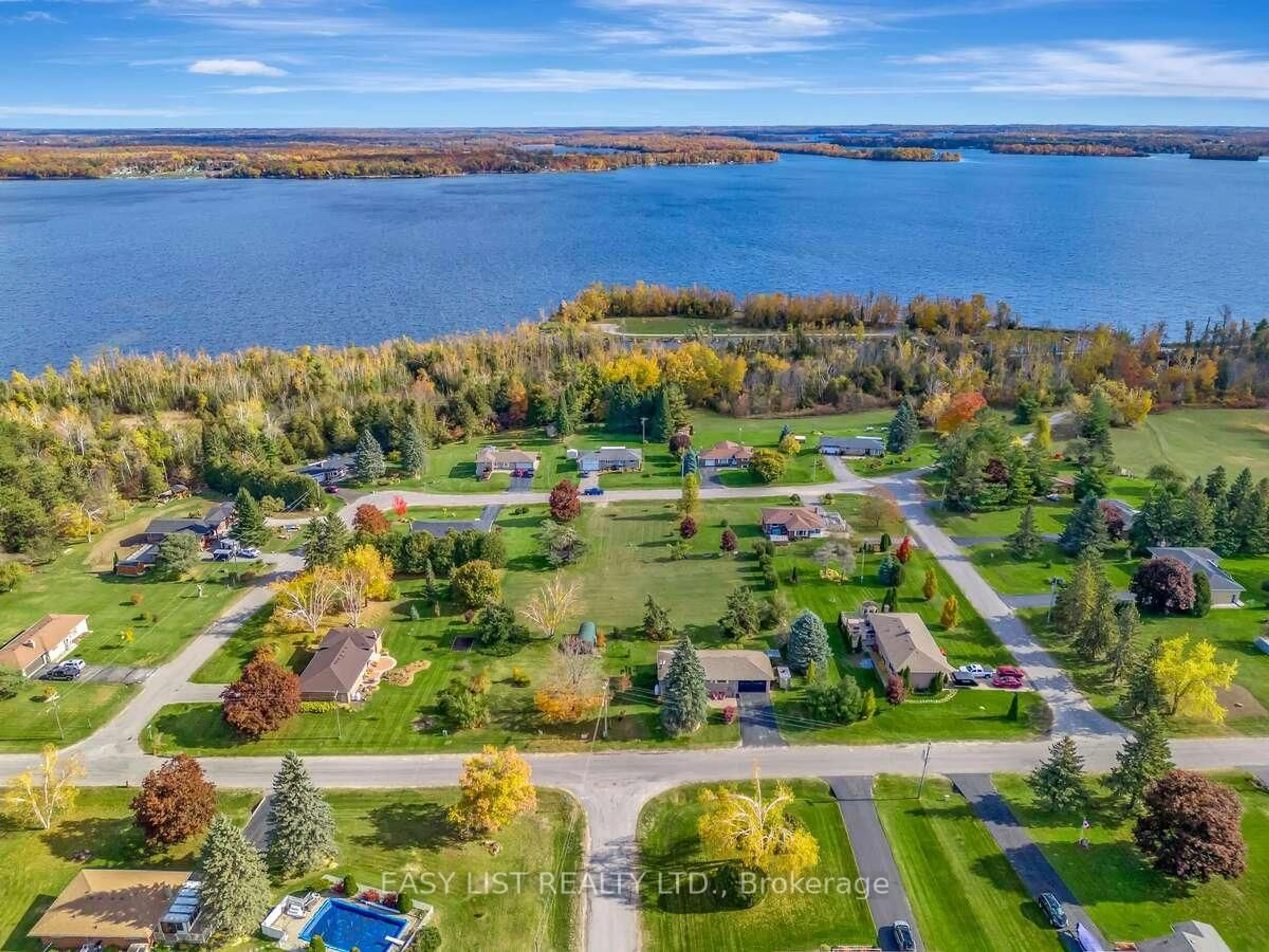 A pic from outside/outdoor area/front of a property/back of a property/a pic from drone, water/lake/river/ocean view for 456 Old Surrey Lane, Kawartha Lakes Ontario K0M 1A0