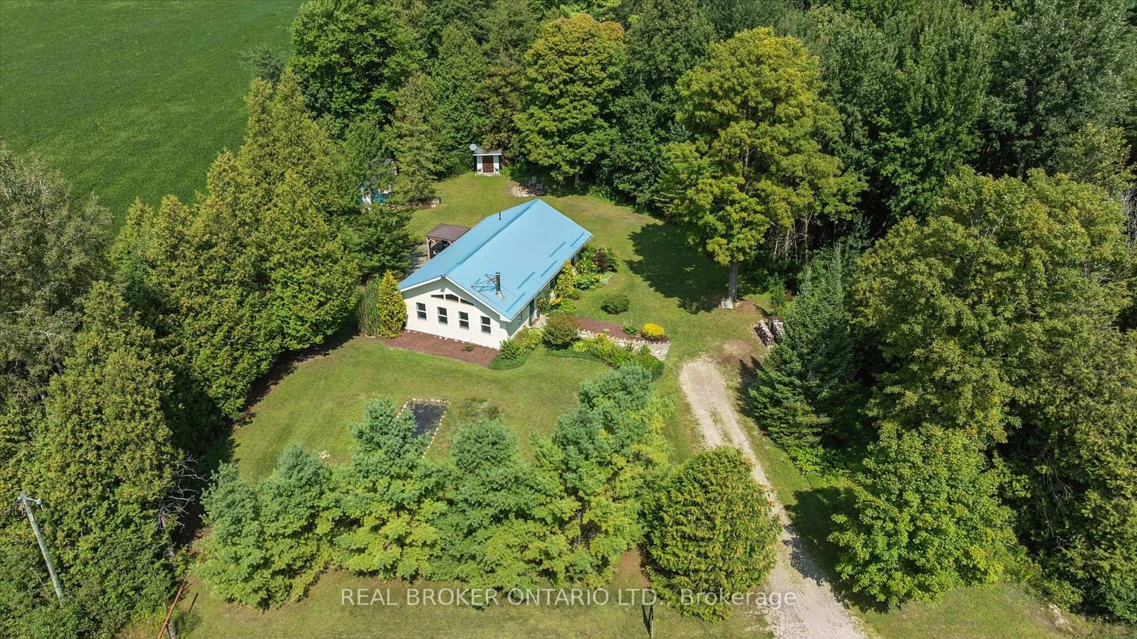 A pic from outside/outdoor area/front of a property/back of a property/a pic from drone, unknown for 5578 11th Line, Minto Ontario N0G 1Z0