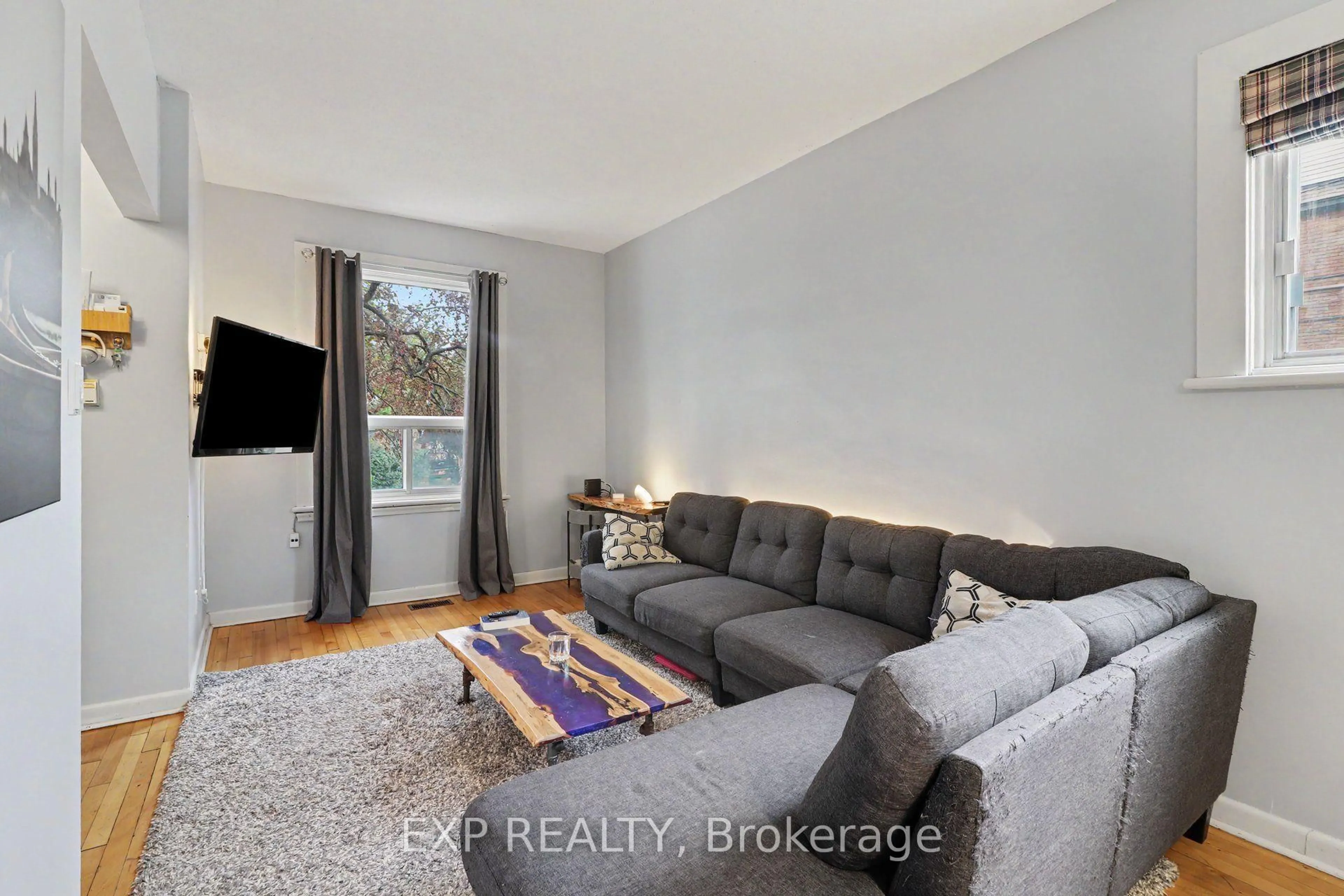 Living room with furniture, unknown for 109 Hopewell Ave, Ottawa Ontario K1S 2Y9