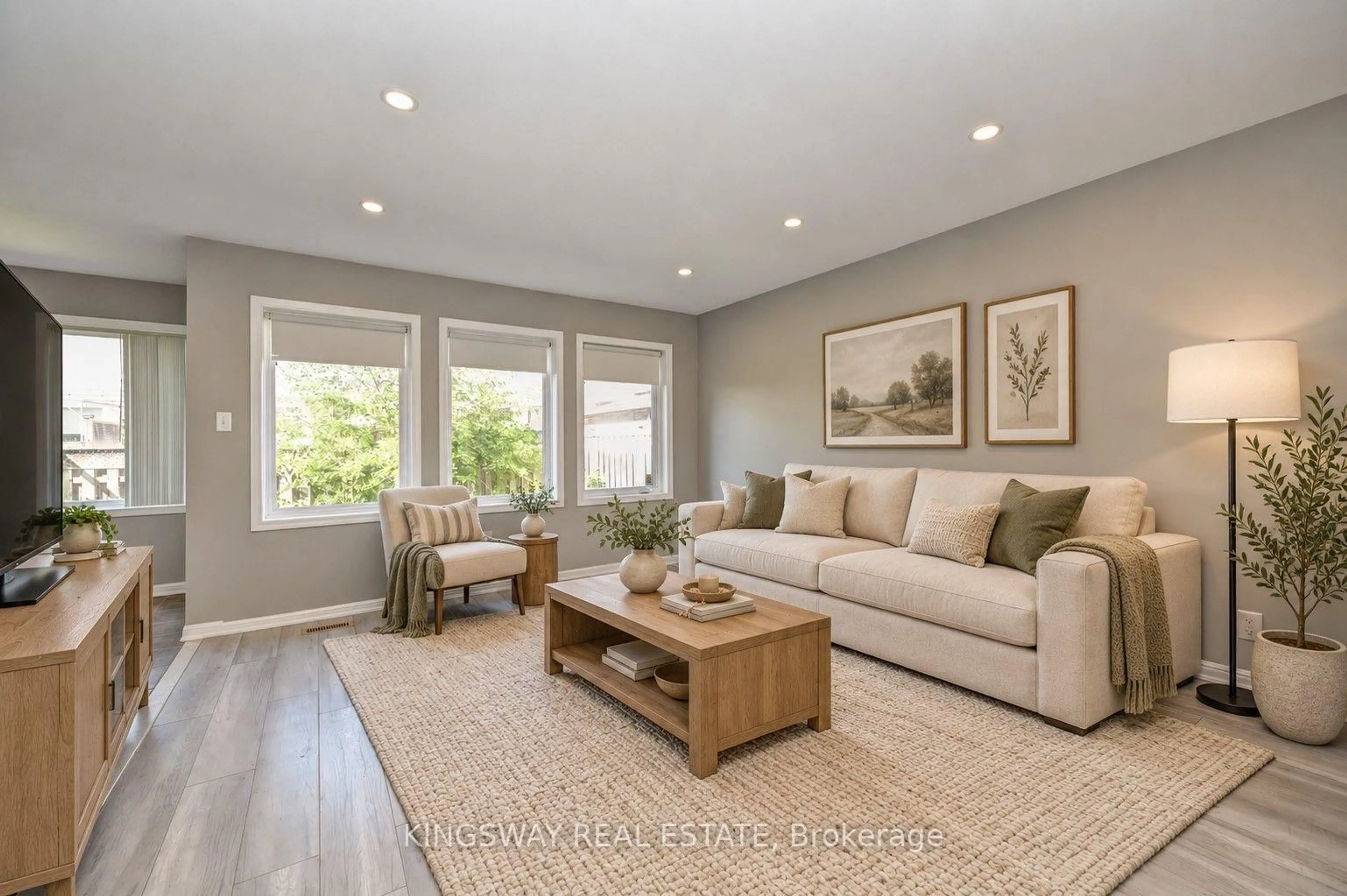 Living room with furniture, wood/laminate floor for 103 Blackbird Circ, Cambridge Ontario N3C 0A9