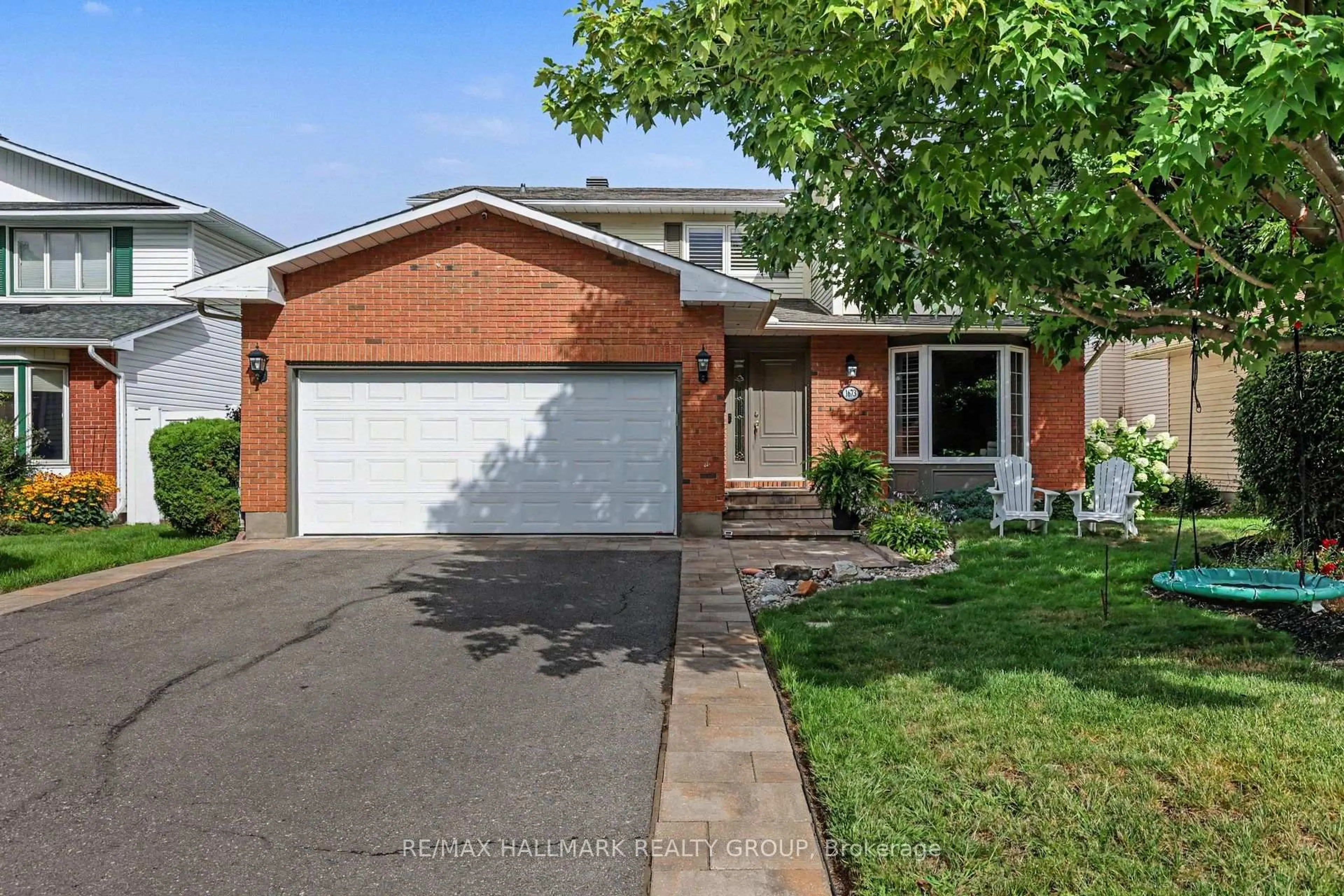 Home with brick exterior material, street for 1673 Teslin Crt, Orleans Ontario K1C 4X1
