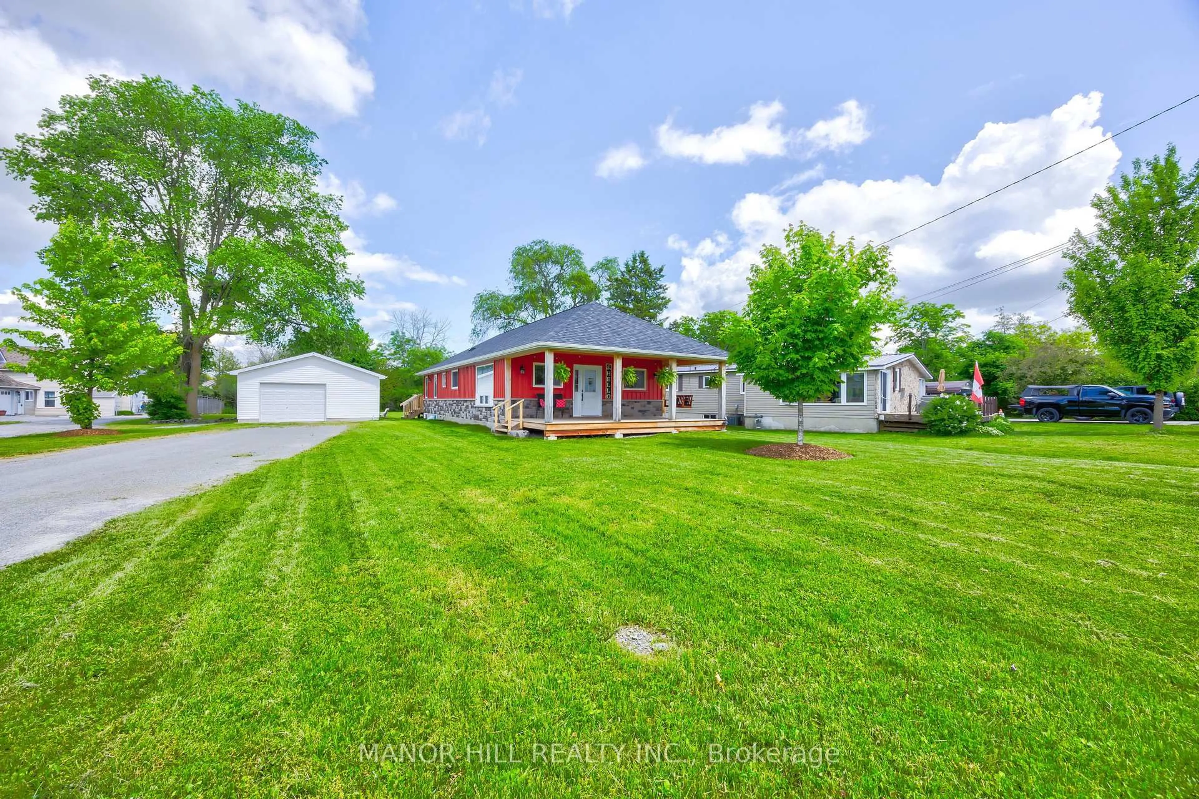 A pic from outside/outdoor area/front of a property/back of a property/a pic from drone, street for 56 West St, Kawartha Lakes Ontario K0M 1N0