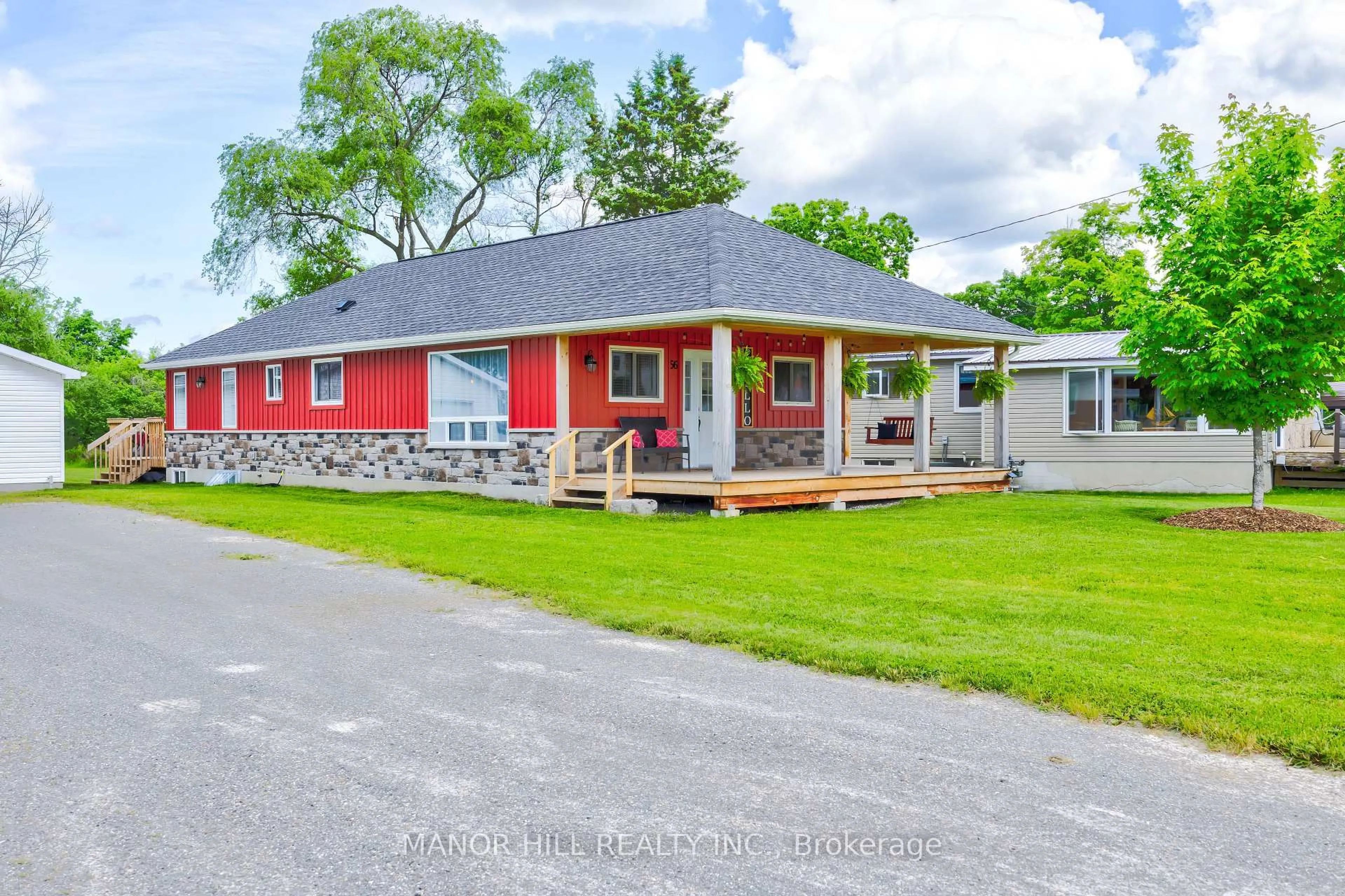 Home with vinyl exterior material, street for 56 West St, Kawartha Lakes Ontario K0M 1N0