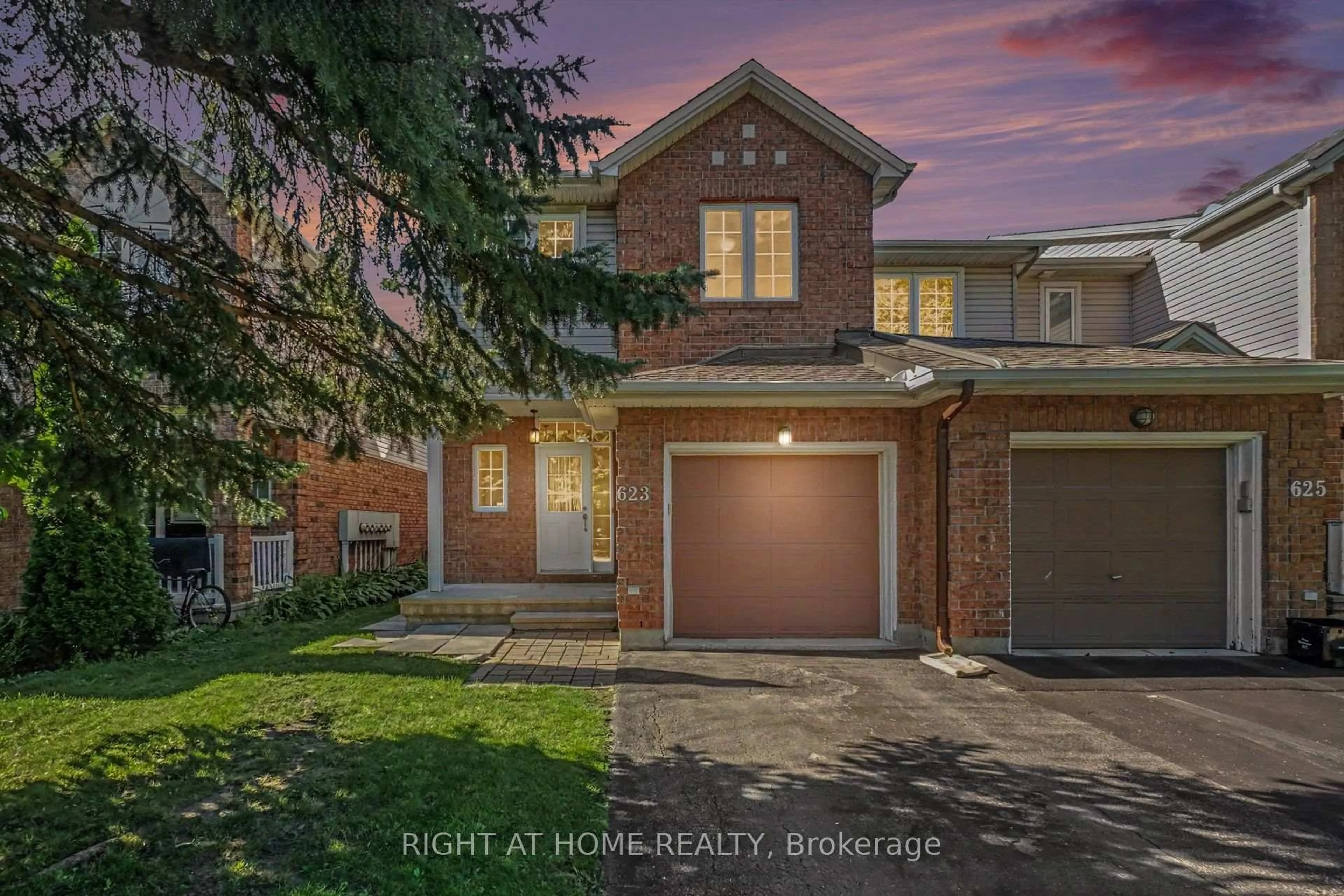 Home with brick exterior material, street for 623 Wild Shore Cres, Ottawa Ontario K1V 1T3