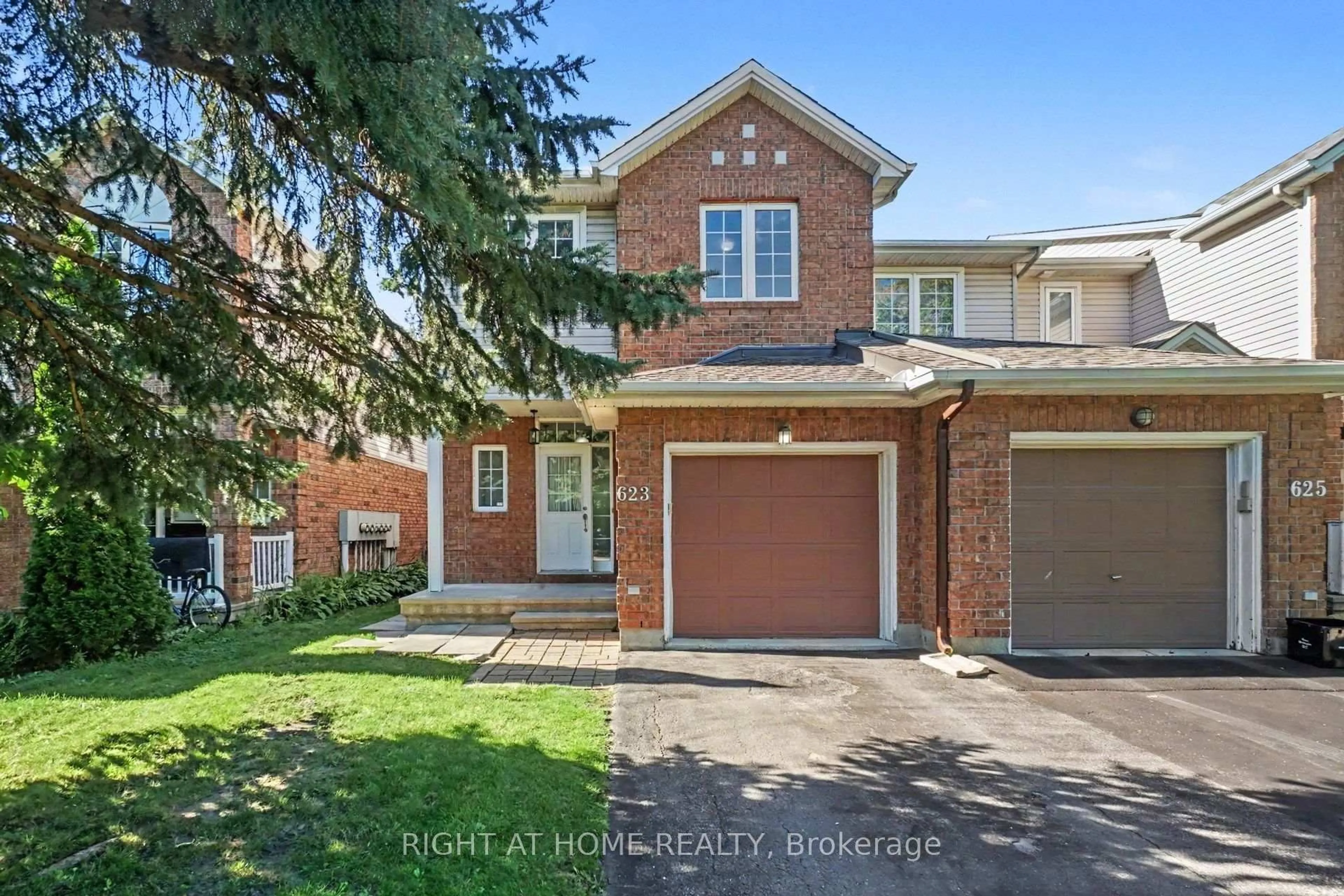 Home with brick exterior material, street for 623 Wild Shore Cres, Ottawa Ontario K1V 1T3