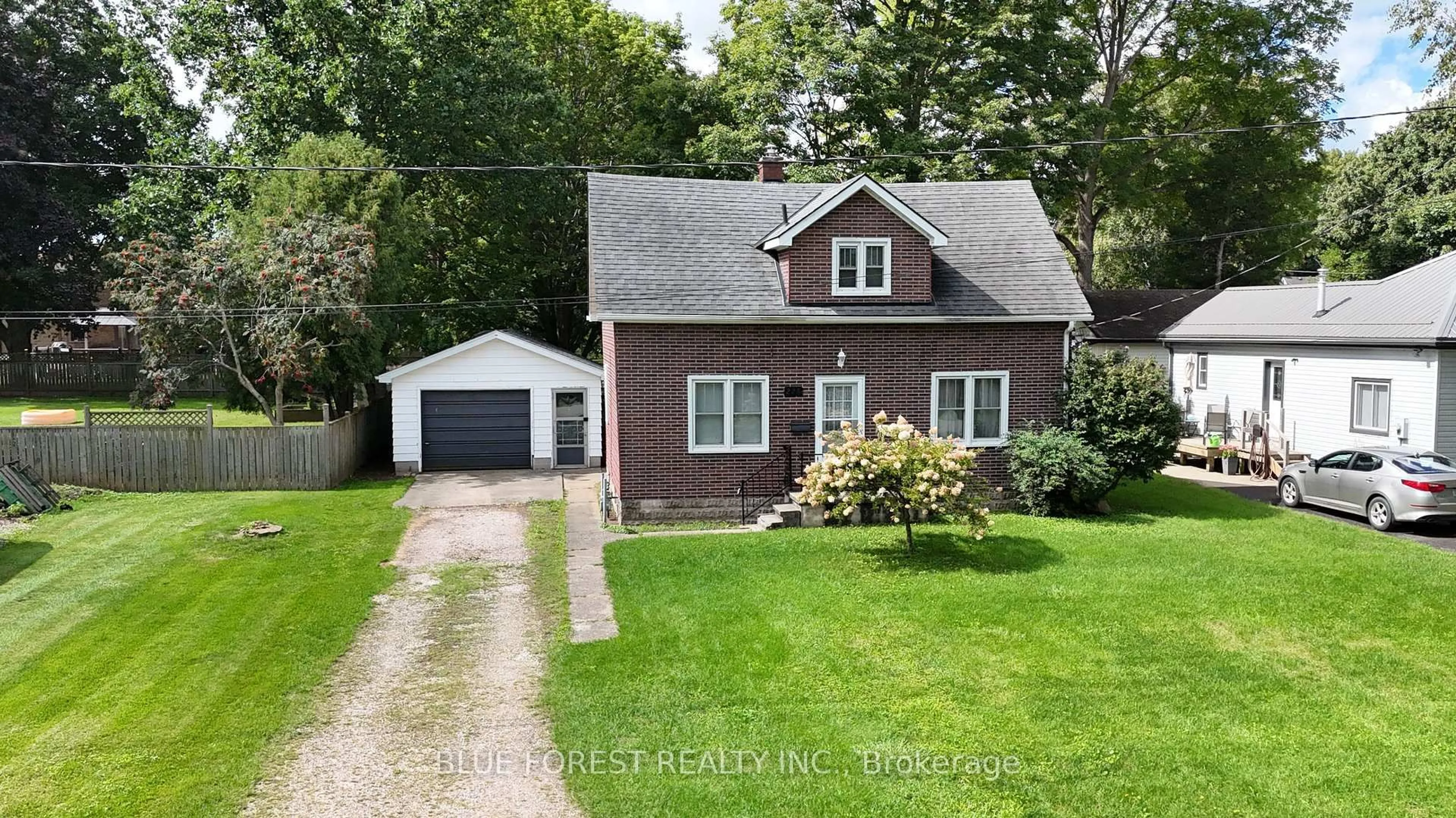 A pic from outside/outdoor area/front of a property/back of a property/a pic from drone, street for 228 Flora St, West Elgin Ontario N0L 2C0
