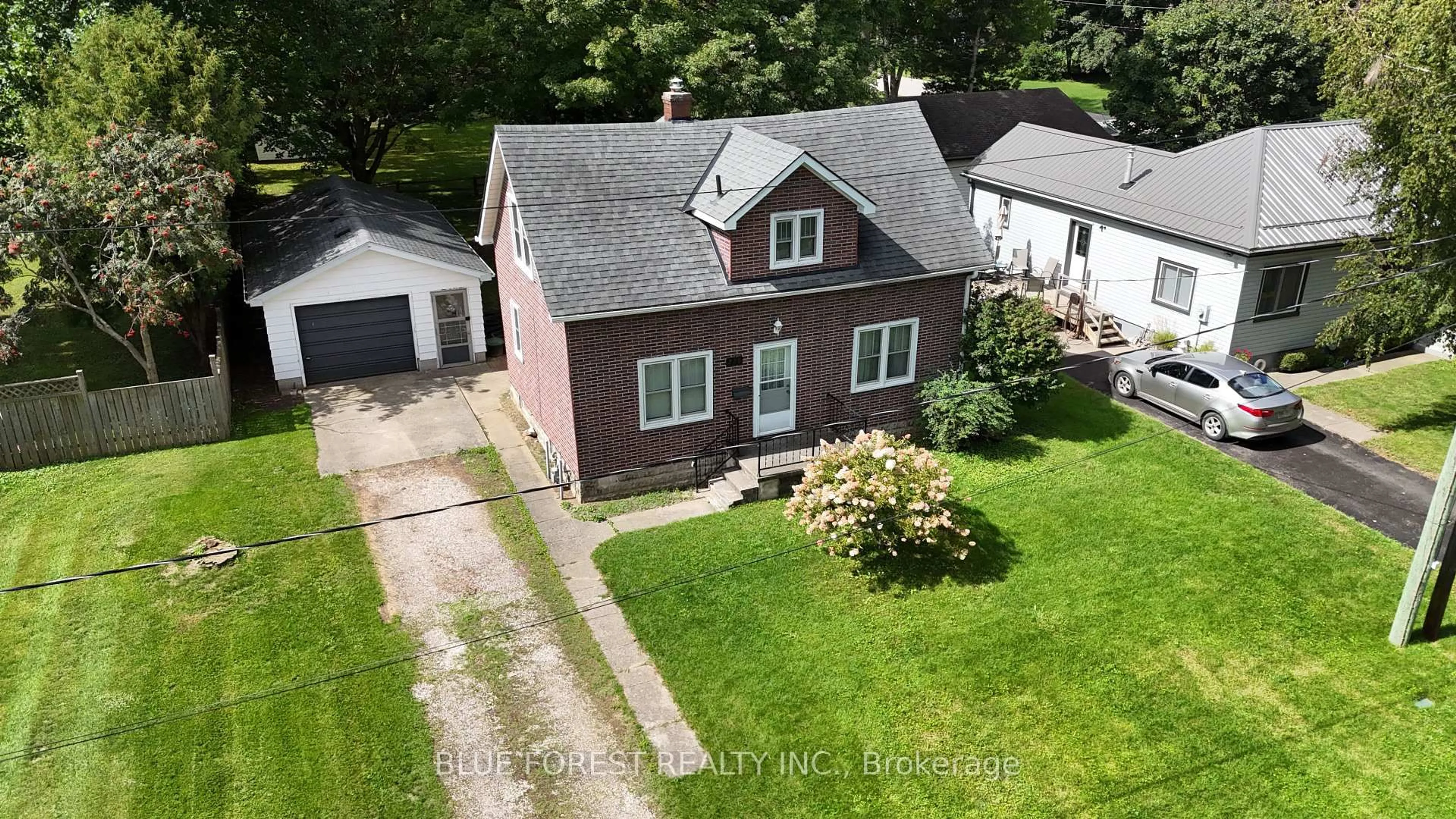 A pic from outside/outdoor area/front of a property/back of a property/a pic from drone, street for 228 Flora St, West Elgin Ontario N0L 2C0