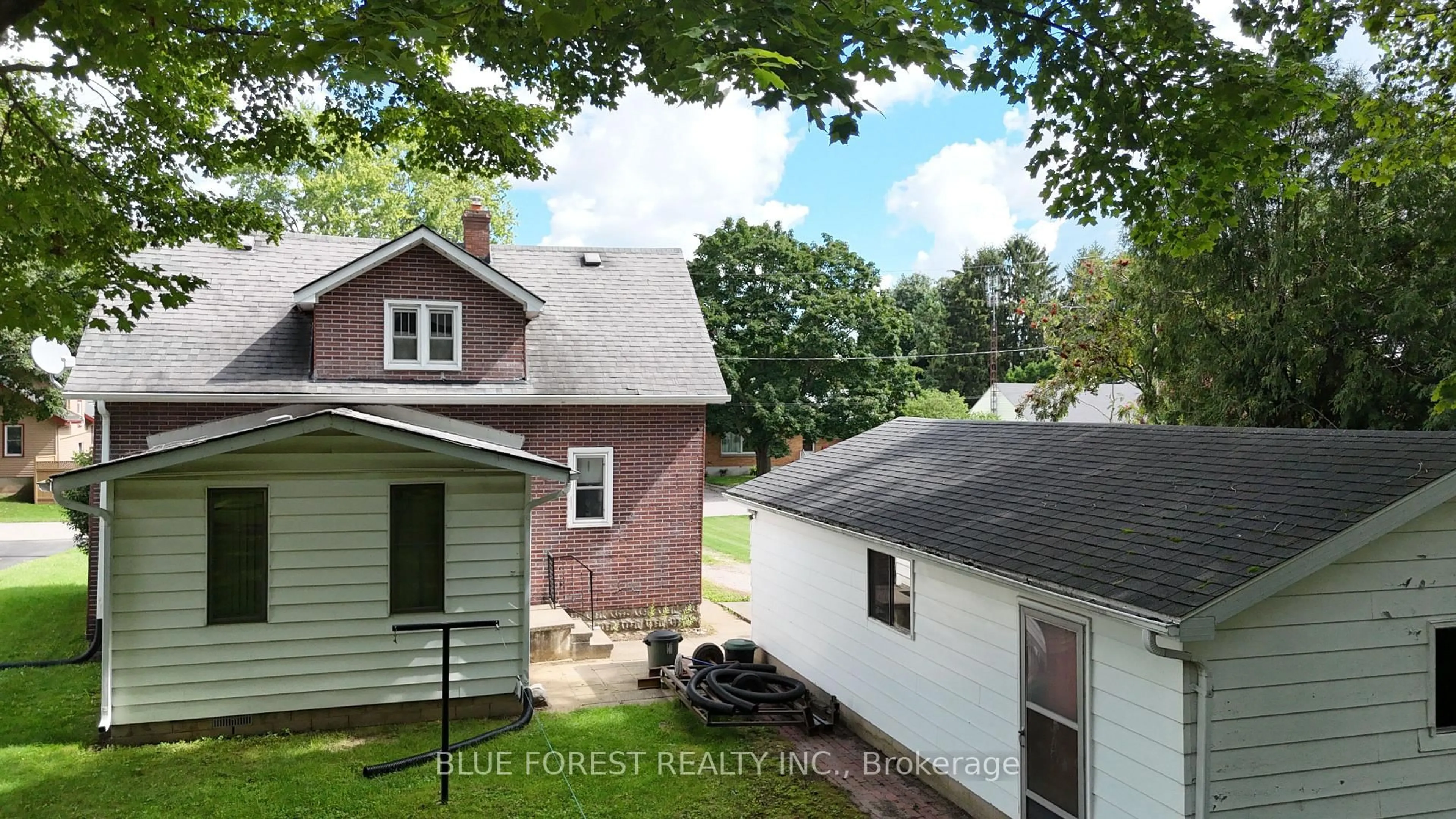 A pic from outside/outdoor area/front of a property/back of a property/a pic from drone, street for 228 Flora St, West Elgin Ontario N0L 2C0