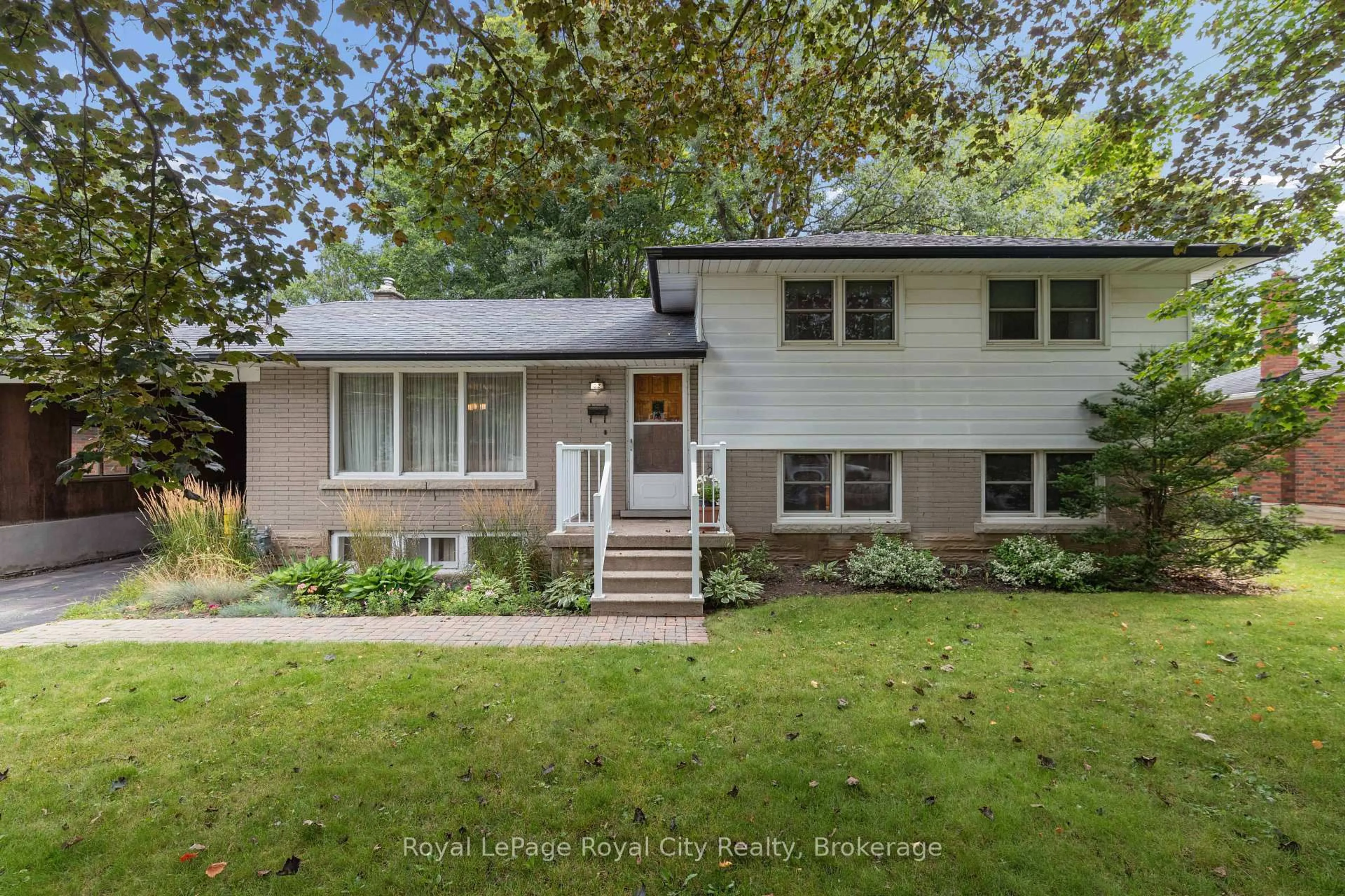 Home with vinyl exterior material, street for 62 Rodney Blvd, Guelph Ontario N1G 2H3