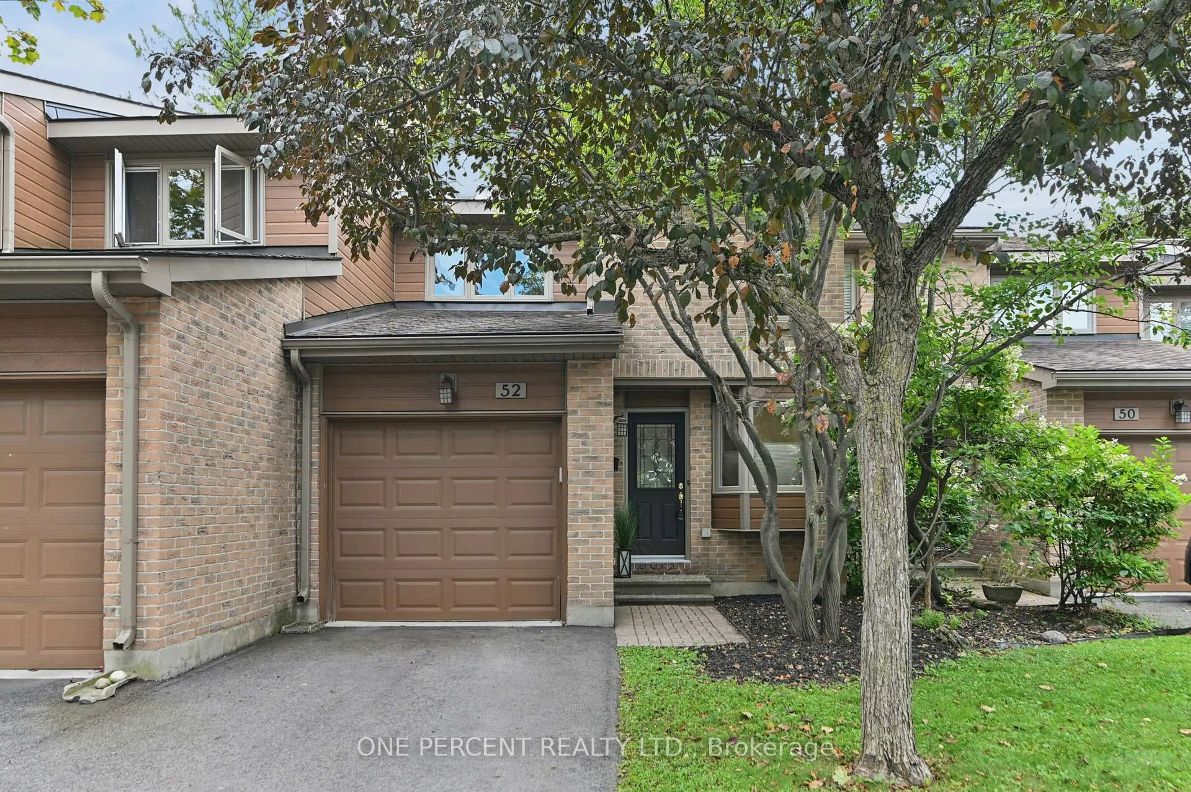 Home with brick exterior material, street for 710 Coronation Ave #52, Ottawa Ontario K1G 4G7