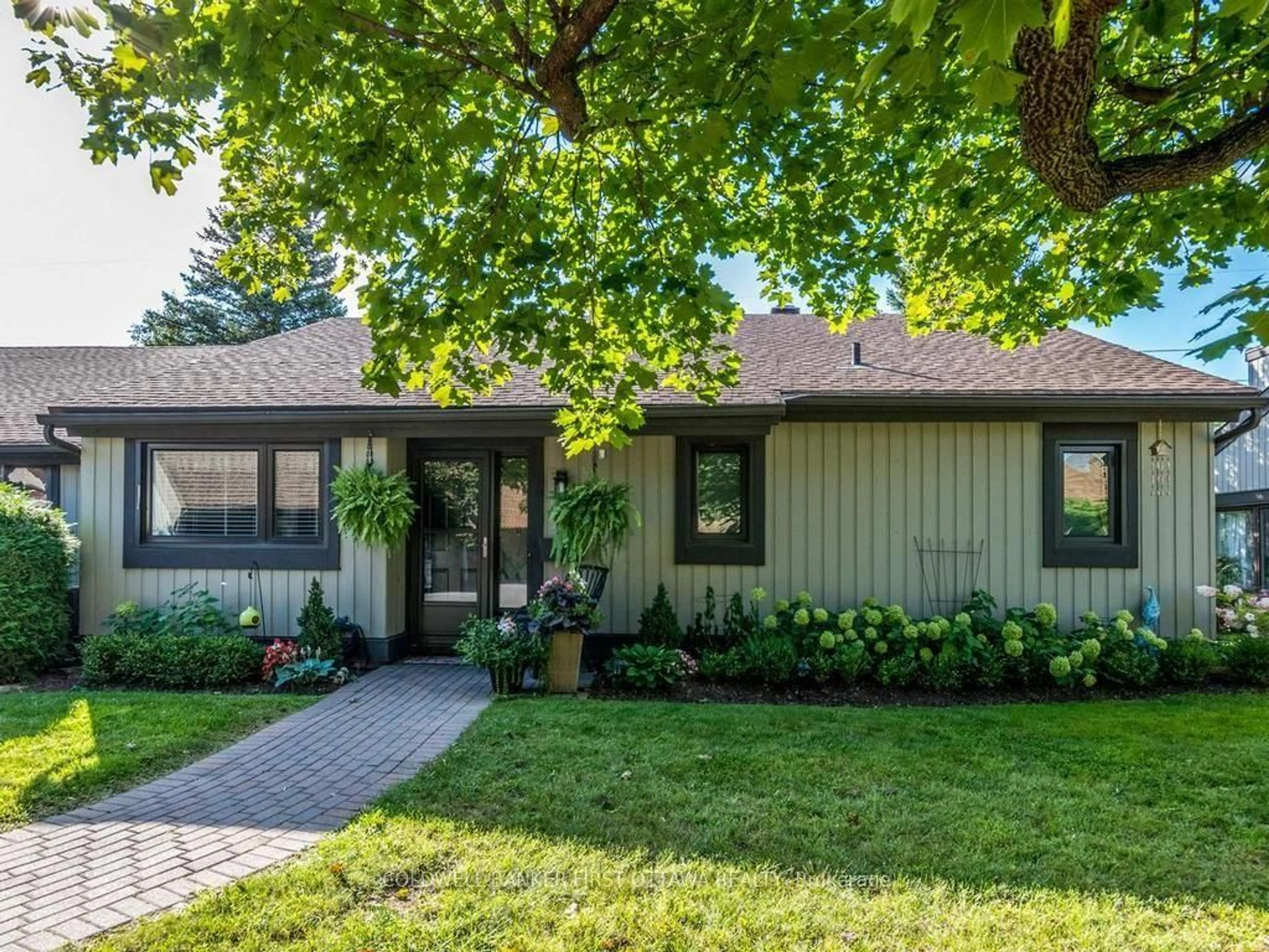 Home with vinyl exterior material, street for 12 Kittansett Crt, Ottawa Ontario K2S 1B9