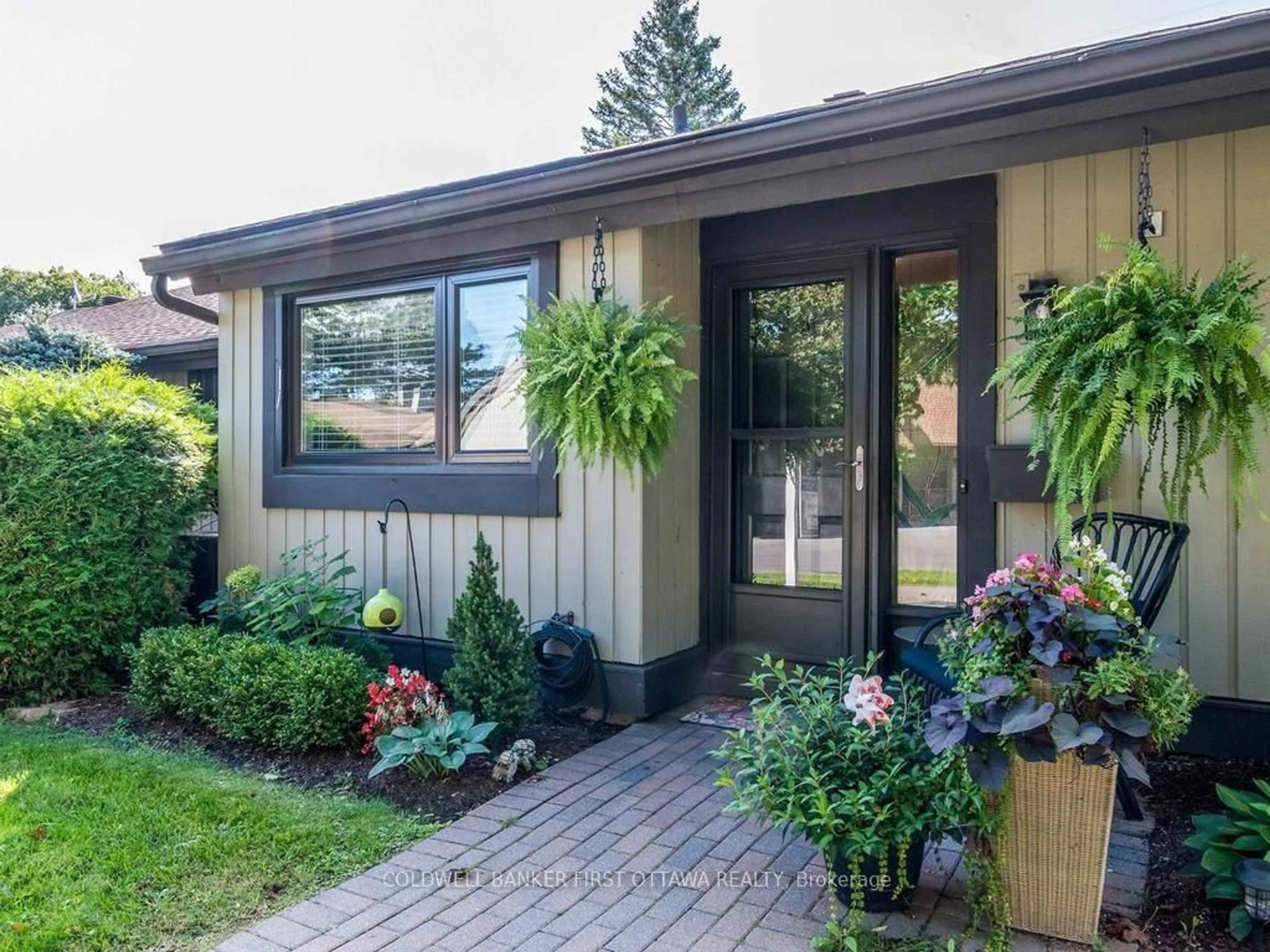Home with vinyl exterior material, street for 12 Kittansett Crt, Ottawa Ontario K2S 1B9