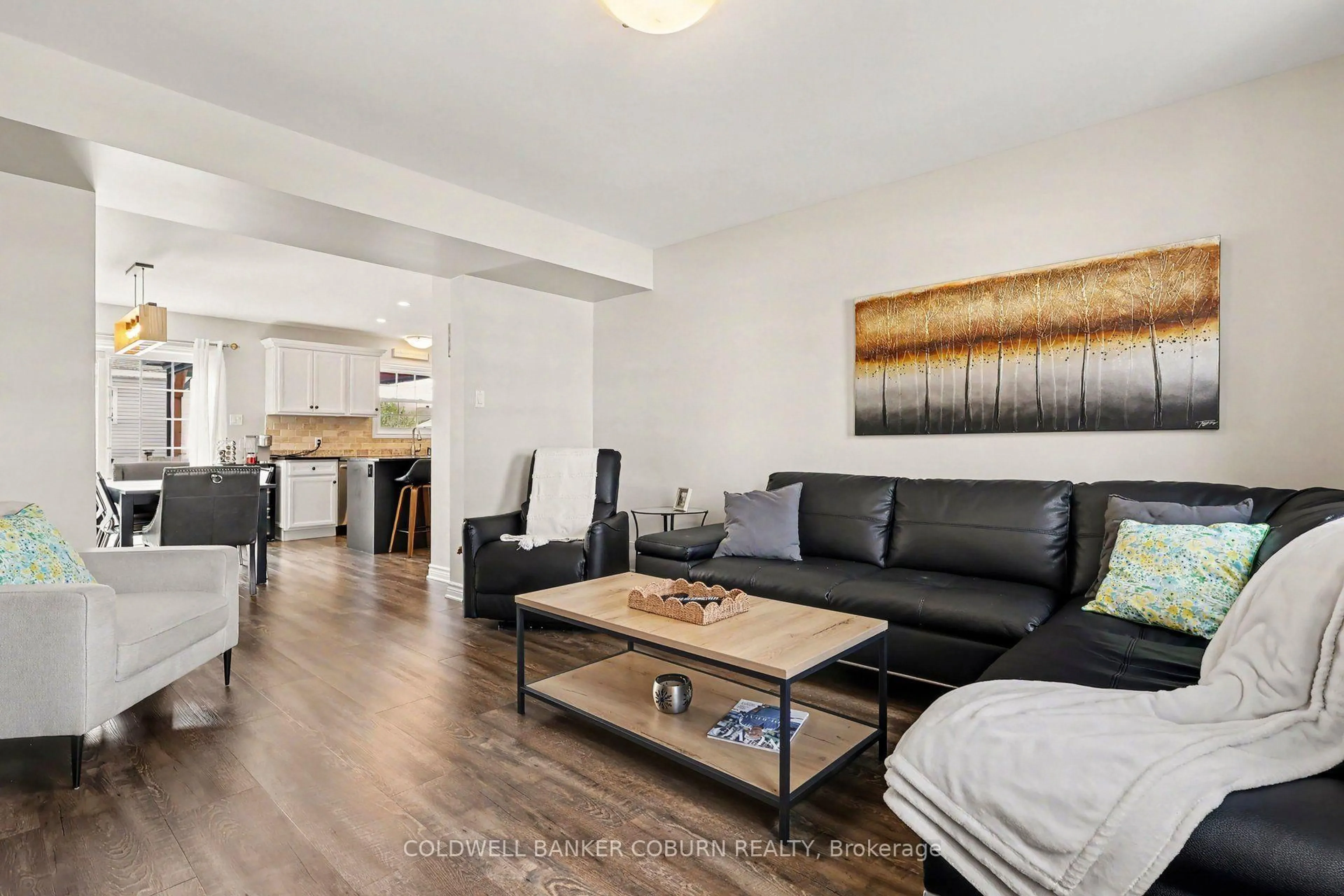 Living room with furniture, wood/laminate floor for 77 Tabitha Cres, North Dundas Ontario K0C 1H0