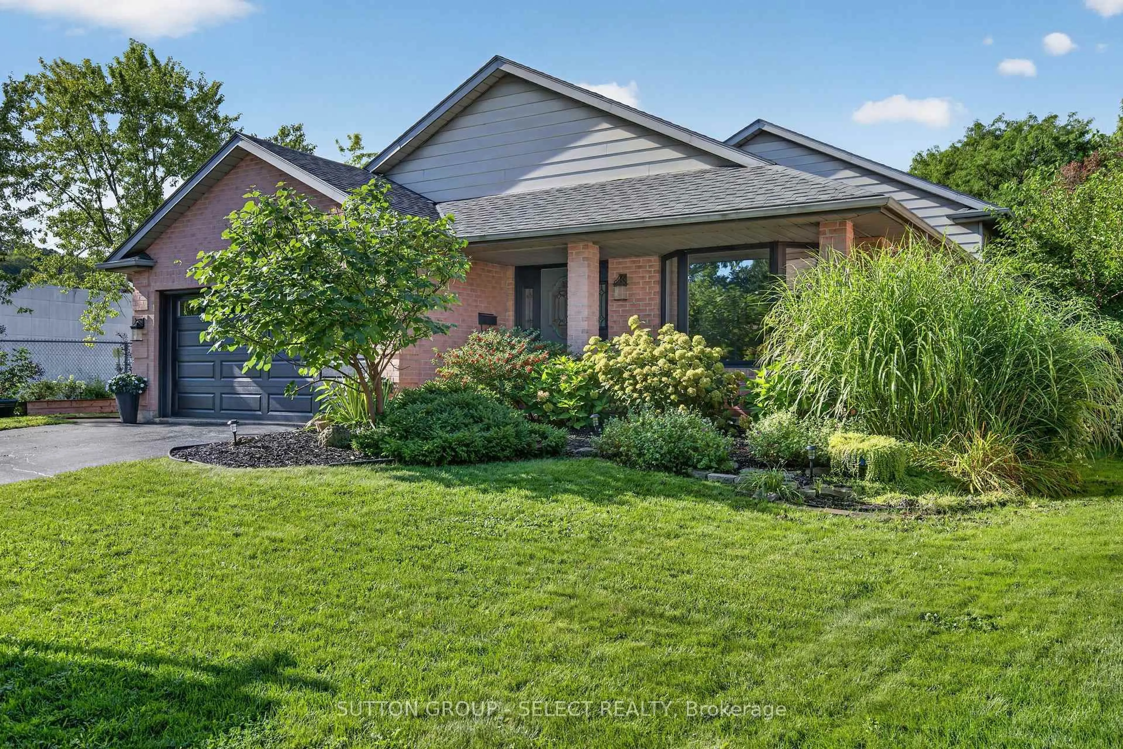 Home with brick exterior material, street for 165 Whisperwood Ave, London South Ontario N6K 4C6