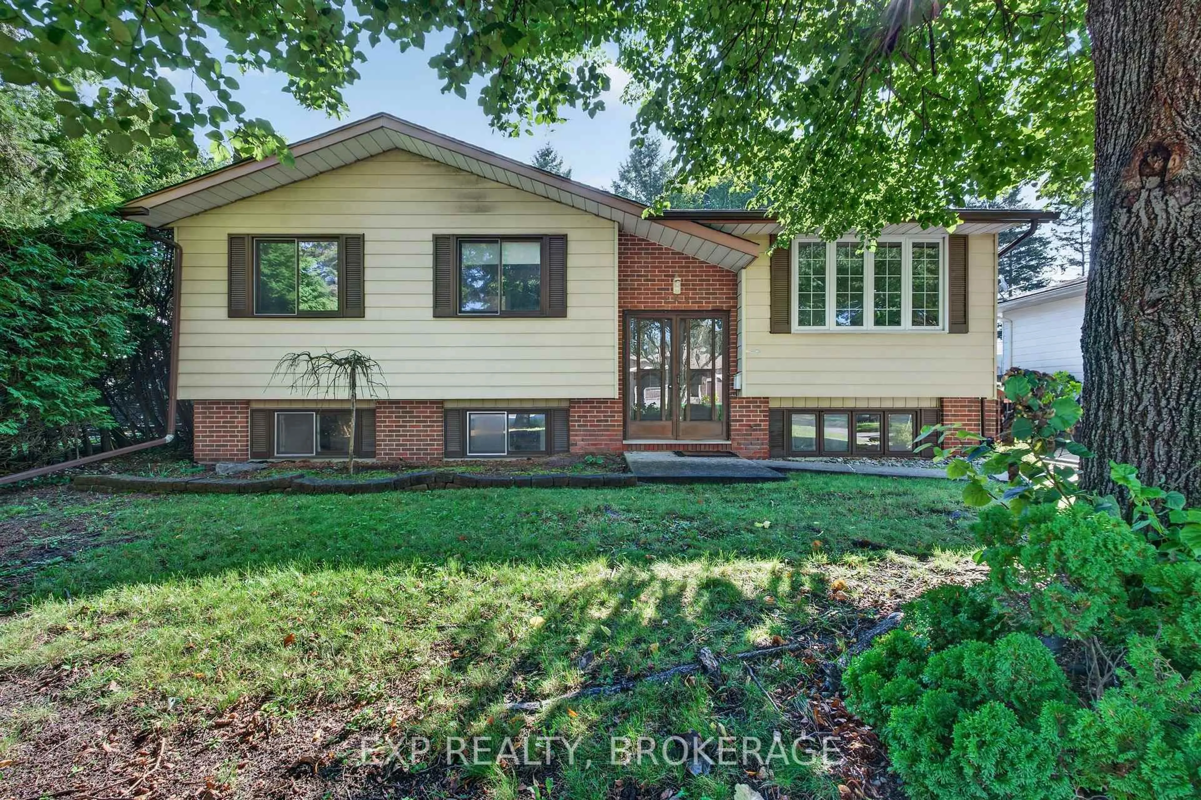 Home with brick exterior material, street for 920 SAFARI Dr, Kingston Ontario K7M 6X5