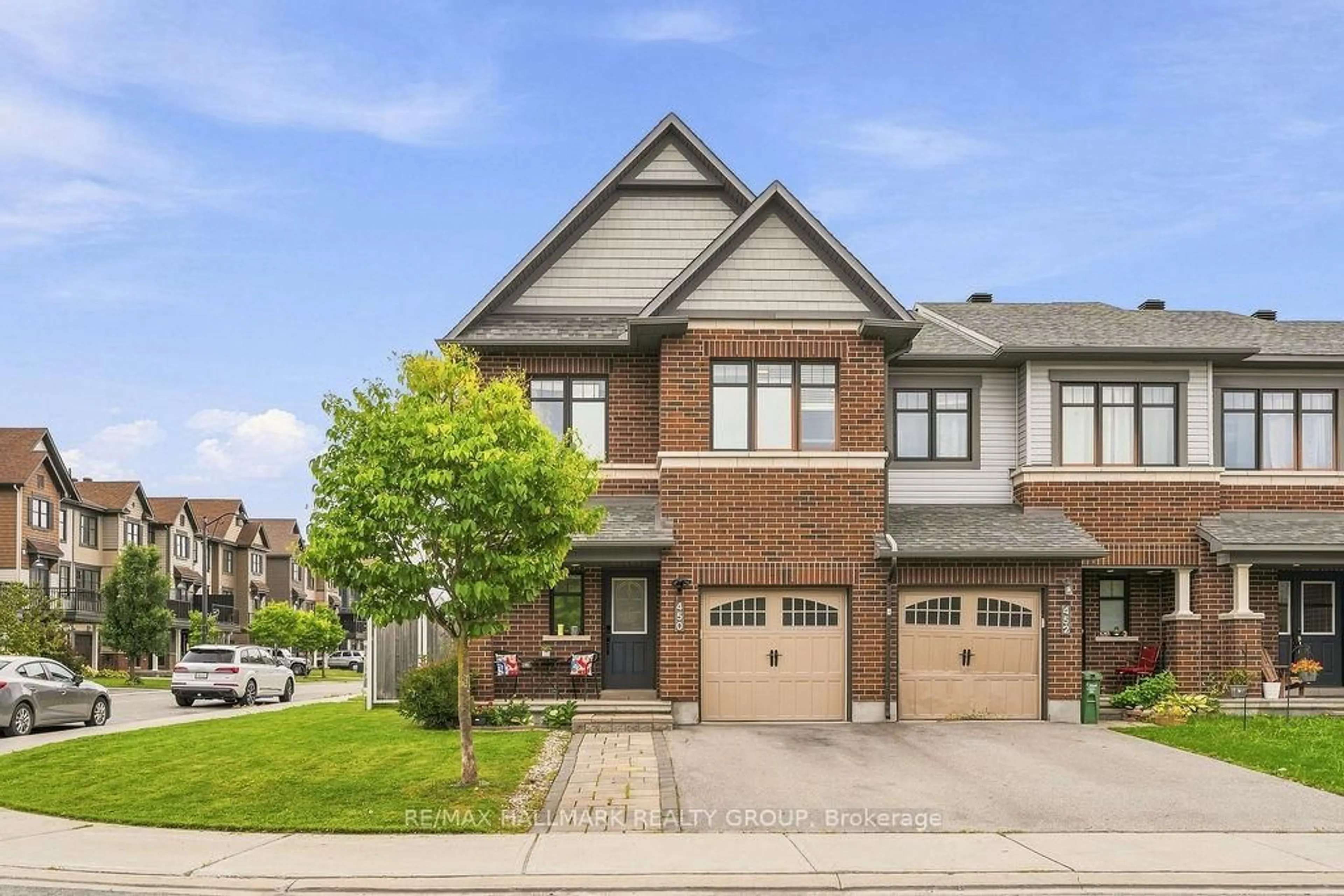 Home with brick exterior material, street for 450 Brettonwood Rdge, Ottawa Ontario K2T 0L1