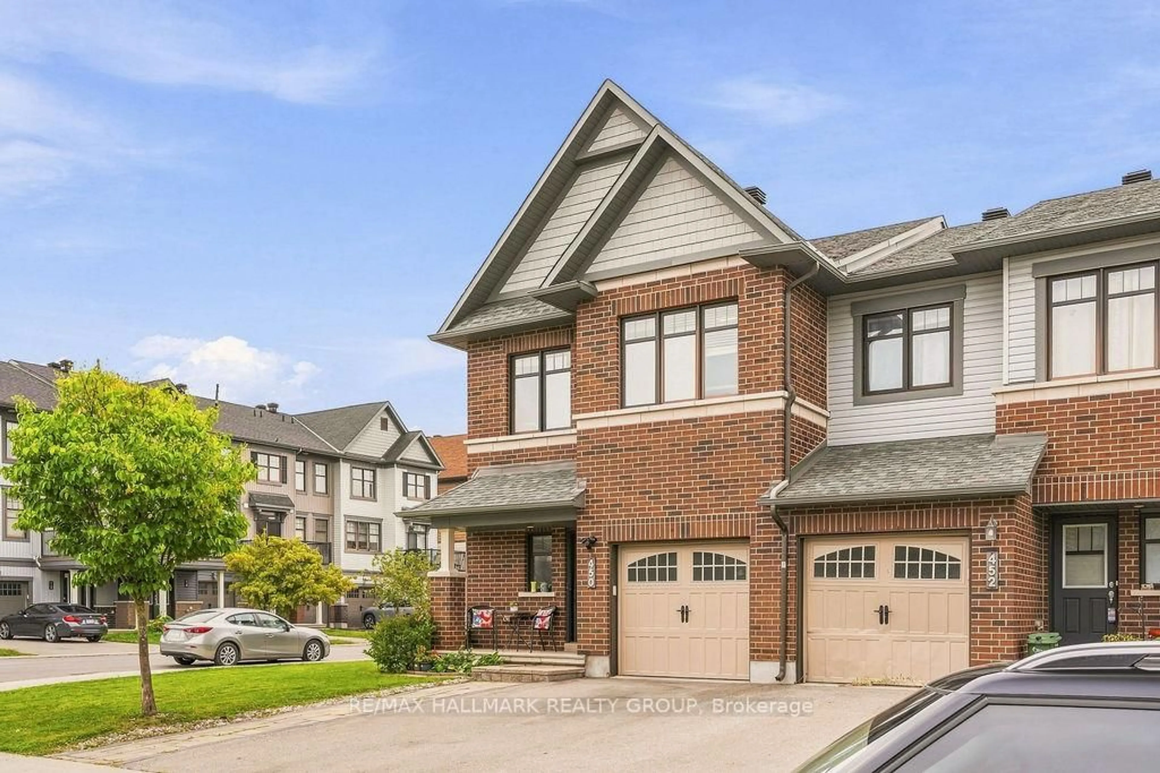 Home with brick exterior material, street for 450 Brettonwood Rdge, Ottawa Ontario K2T 0L1