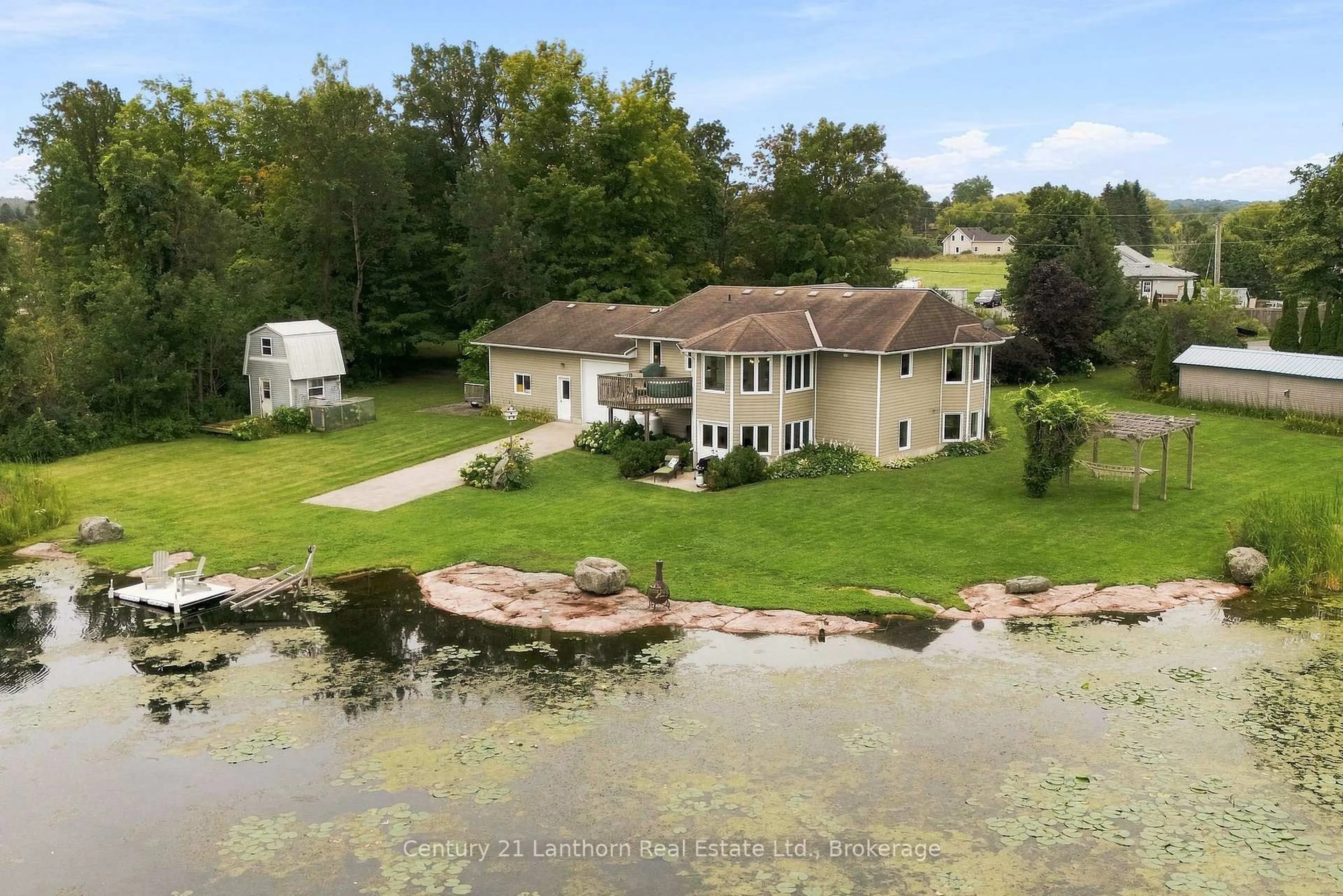 A pic from outside/outdoor area/front of a property/back of a property/a pic from drone, water/lake/river/ocean view for 2318 Hutcheson (HWY 15) Dr, Kingston Ontario K7L 4V3