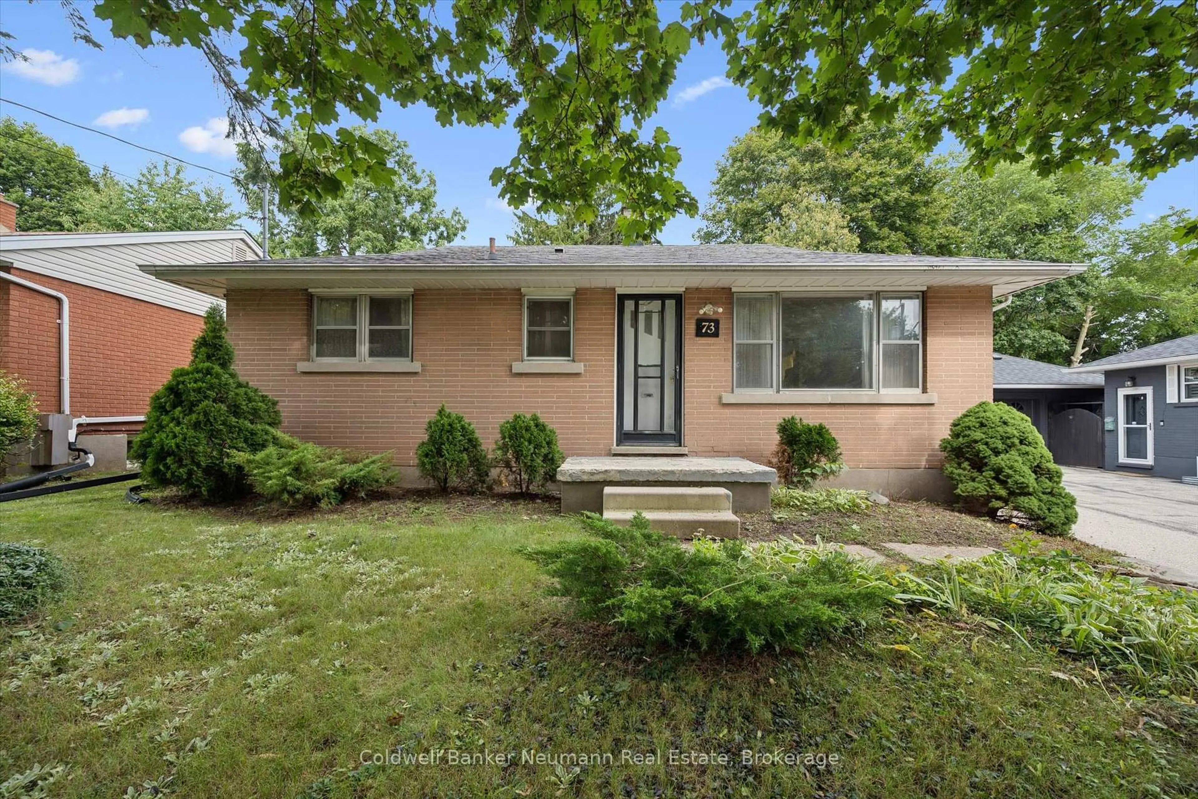 Home with brick exterior material, street for 73 Knightswood Blvd, Guelph Ontario N1E 3W6