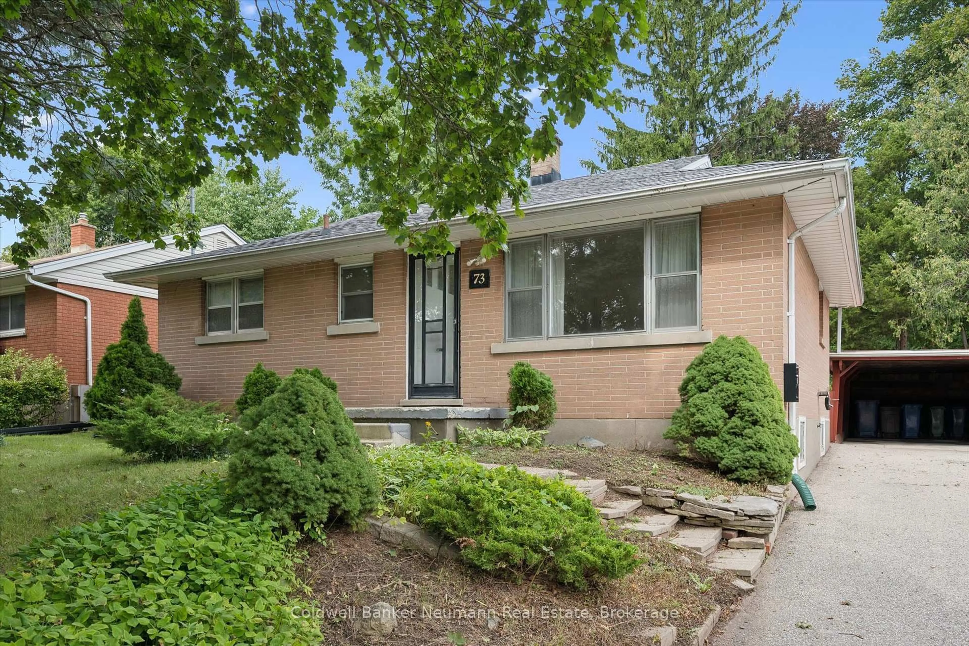 Home with brick exterior material, street for 73 Knightswood Blvd, Guelph Ontario N1E 3W6