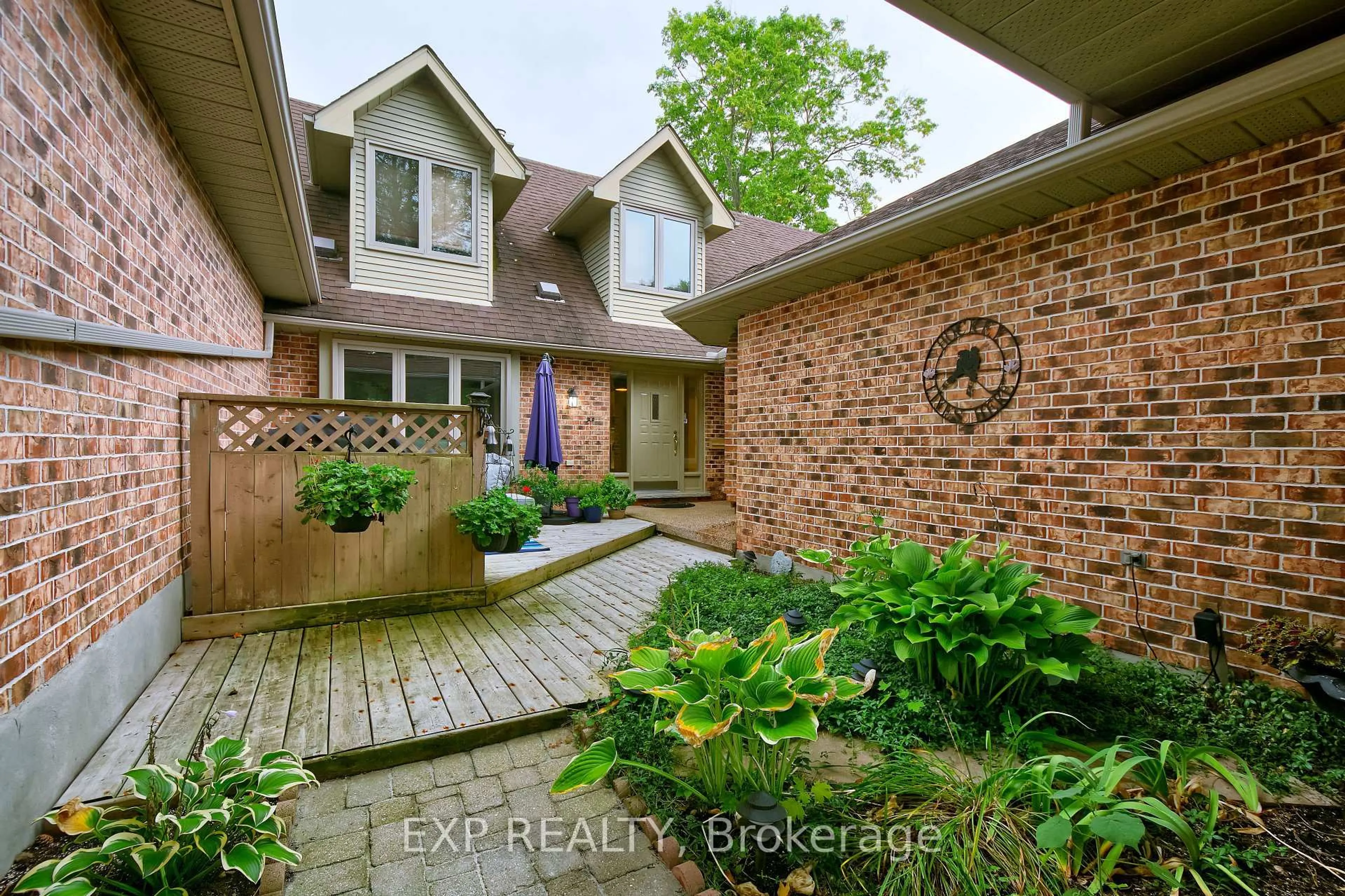 Home with brick exterior material, street for 1443 Commissioners Rd #29, London South Ontario N6K 1E2