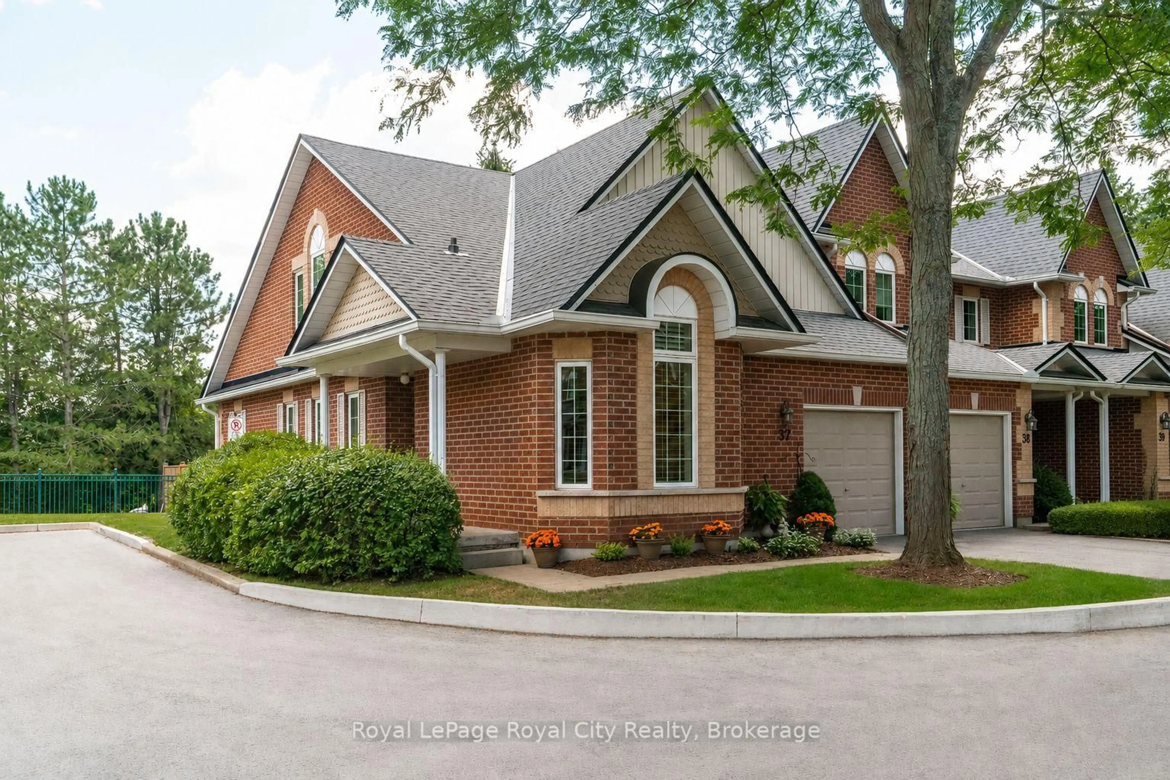 Home with brick exterior material, street for 60 Ptarmigan Dr #37, Guelph Ontario N1C 1E5