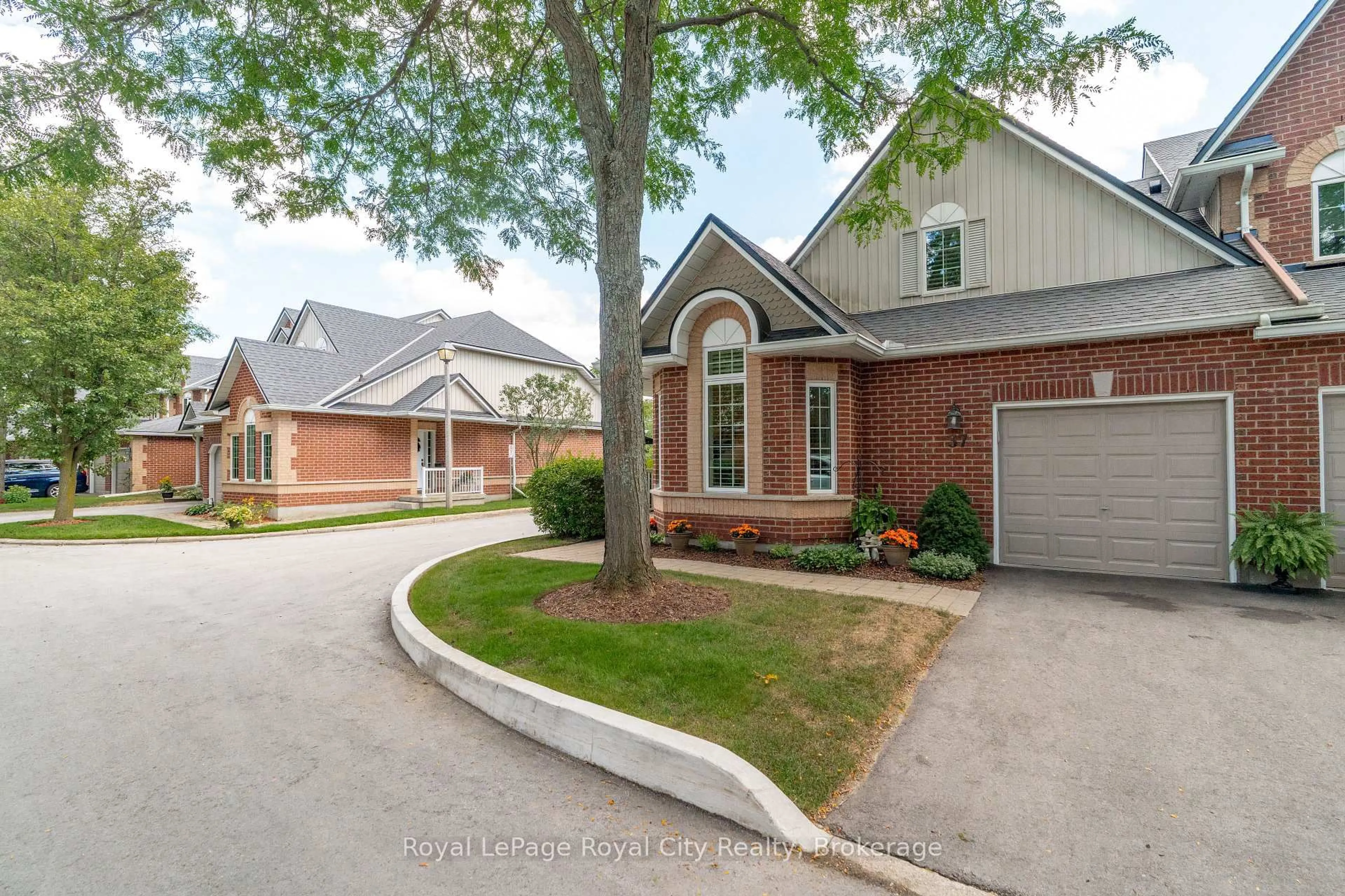 Home with brick exterior material, street for 60 Ptarmigan Dr #37, Guelph Ontario N1C 1E5