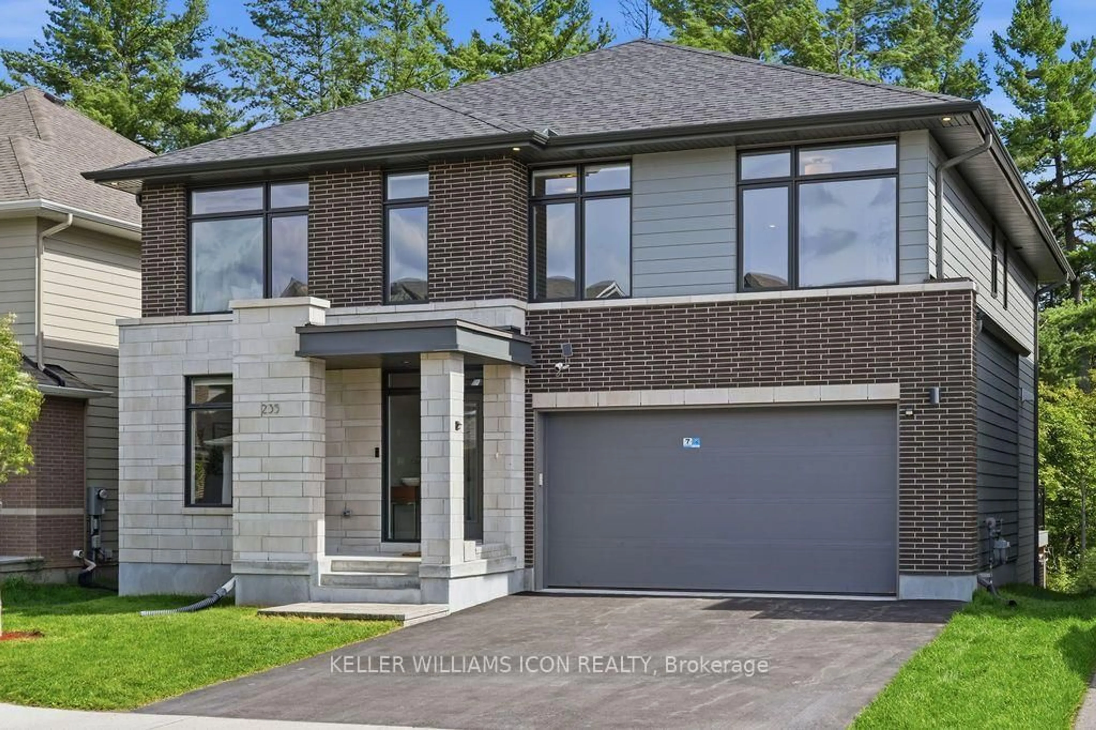 Home with brick exterior material, street for 235 Ketchikan Cres, Ottawa Ontario K2T 0S3