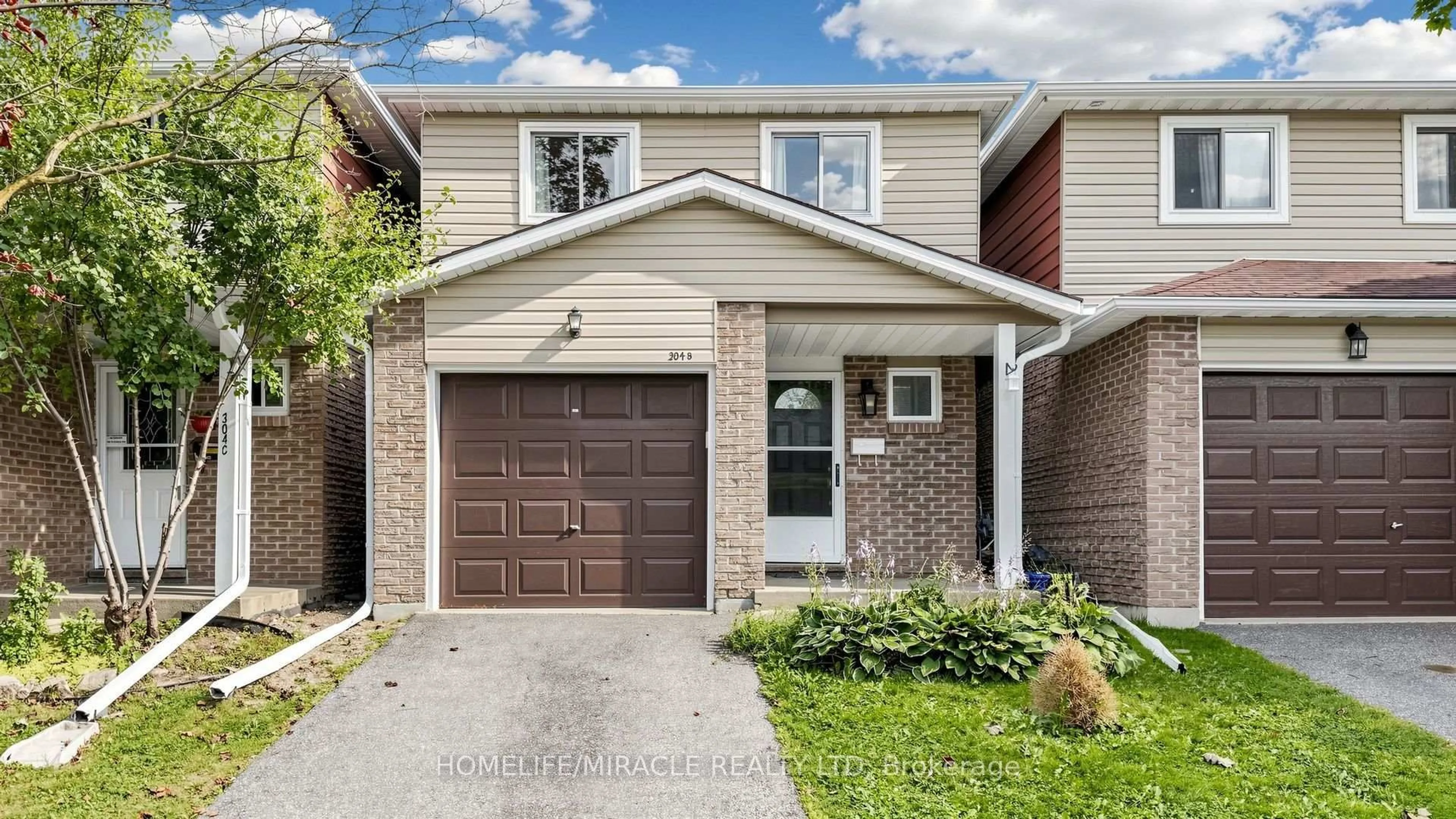 Home with brick exterior material, street for 304 Bluevale St #B, Waterloo Ontario N2J 4G3