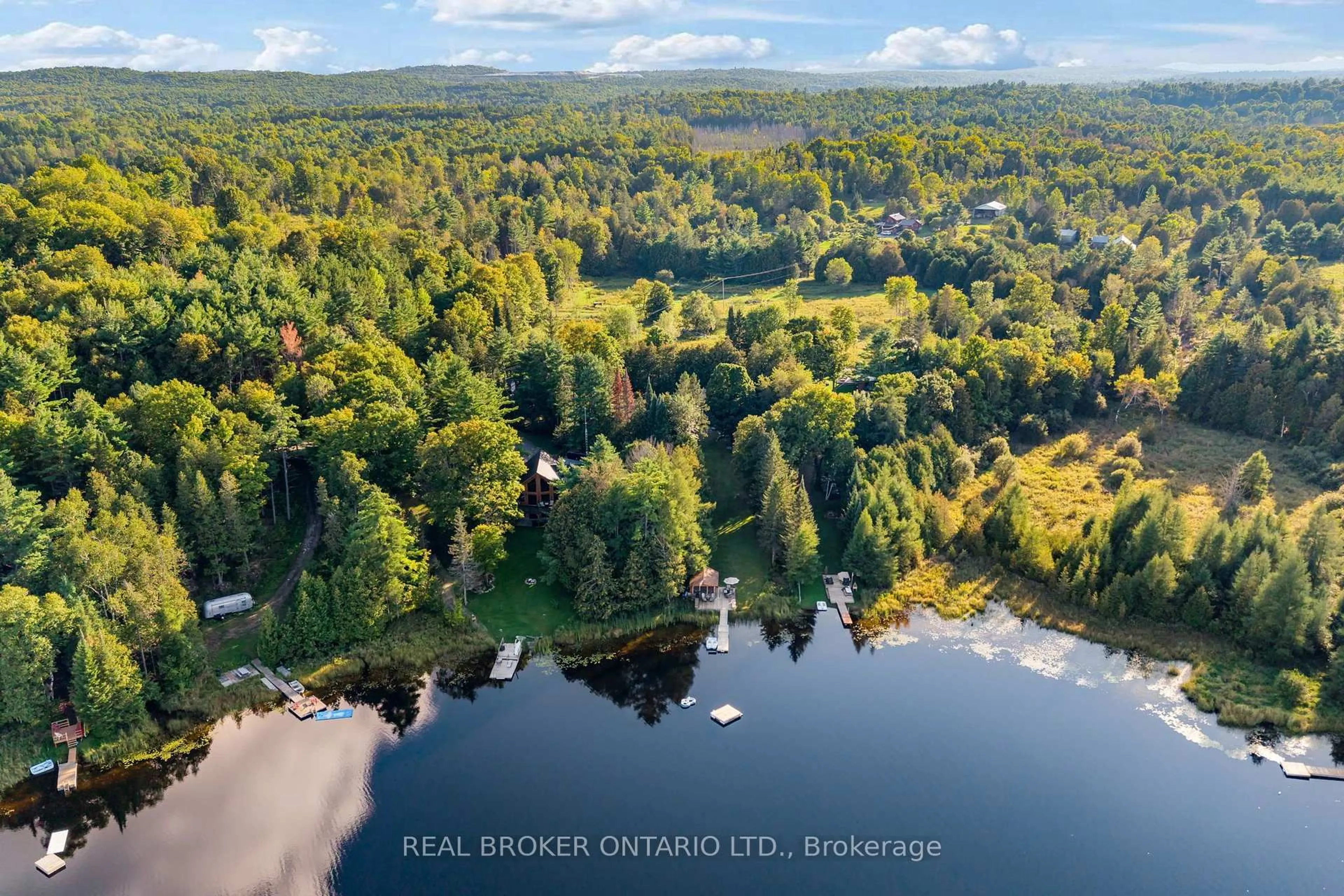 A pic from outside/outdoor area/front of a property/back of a property/a pic from drone, water/lake/river/ocean view for 592 Caldwell Lane, Clayton Ontario K0A 1P0