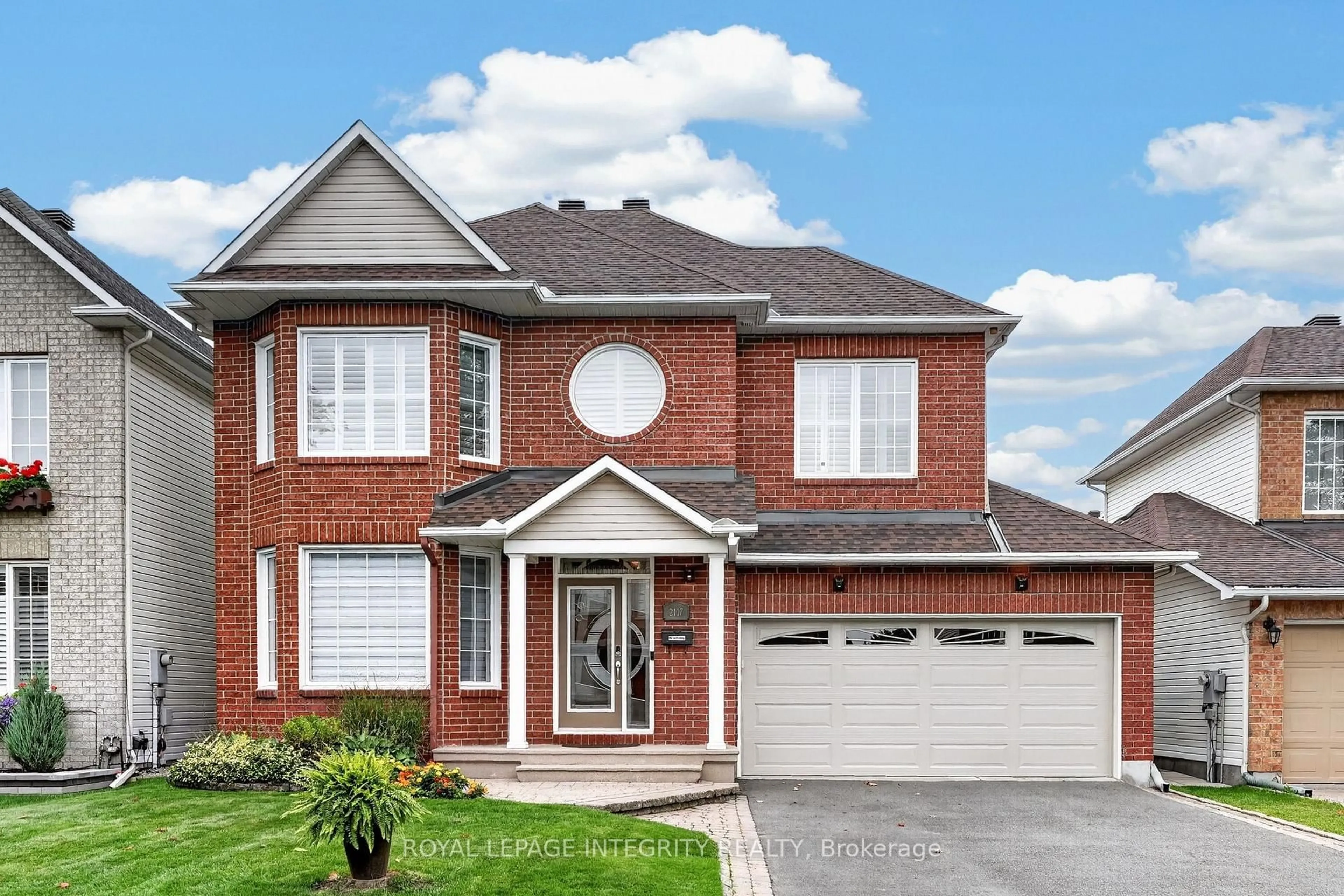 Home with brick exterior material, street for 2117 Sandy Oaks Dr, Ottawa Ontario K1W 1H6