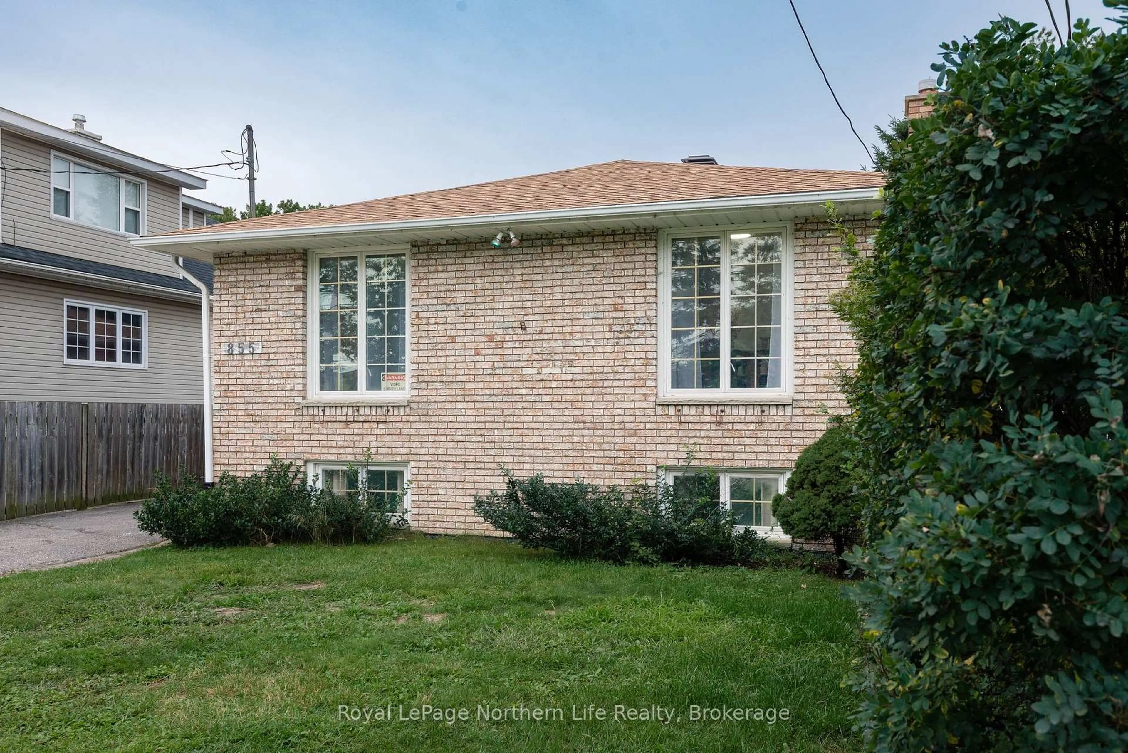 Home with brick exterior material, street for 855 Memorial Dr, North Bay Ontario P1A 1X9