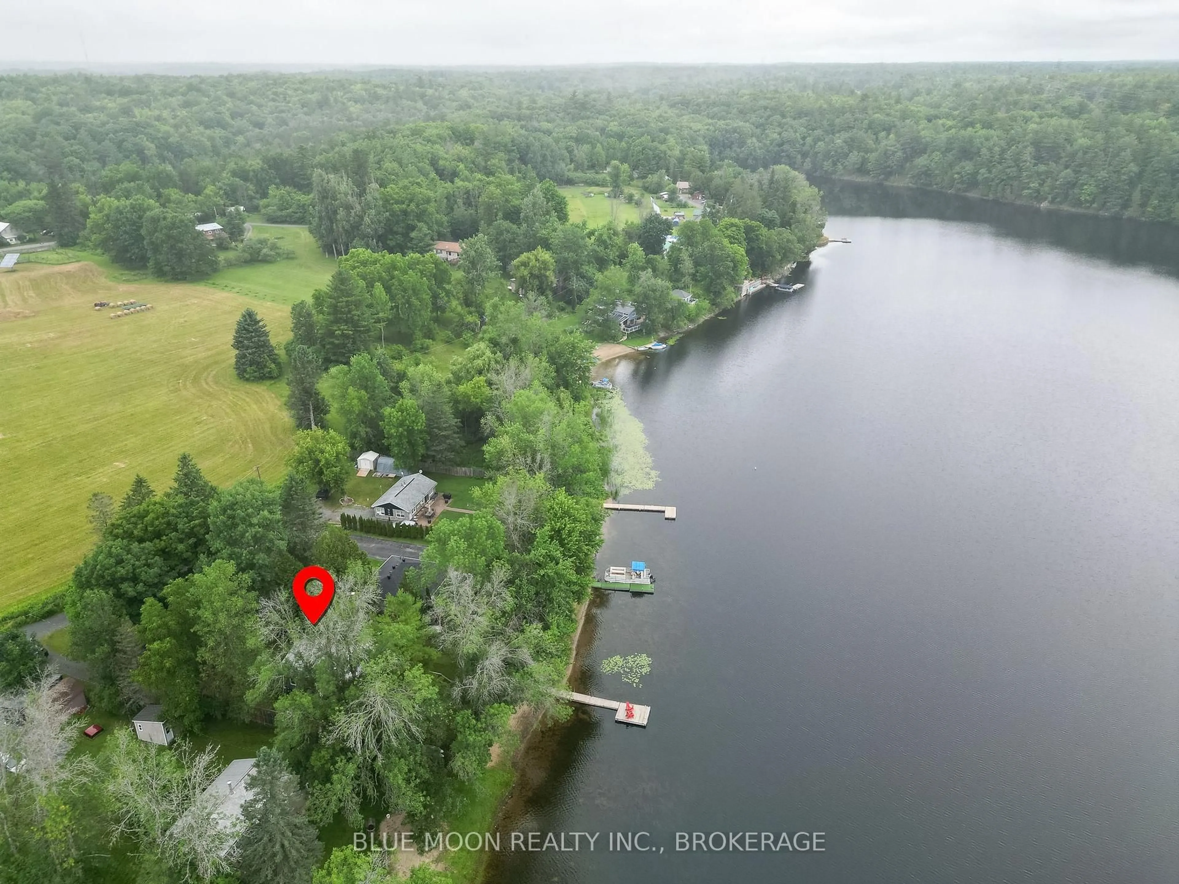 A pic from outside/outdoor area/front of a property/back of a property/a pic from drone, water/lake/river/ocean view for 1058 Memory Lane, Verona Ontario K0H 2W0