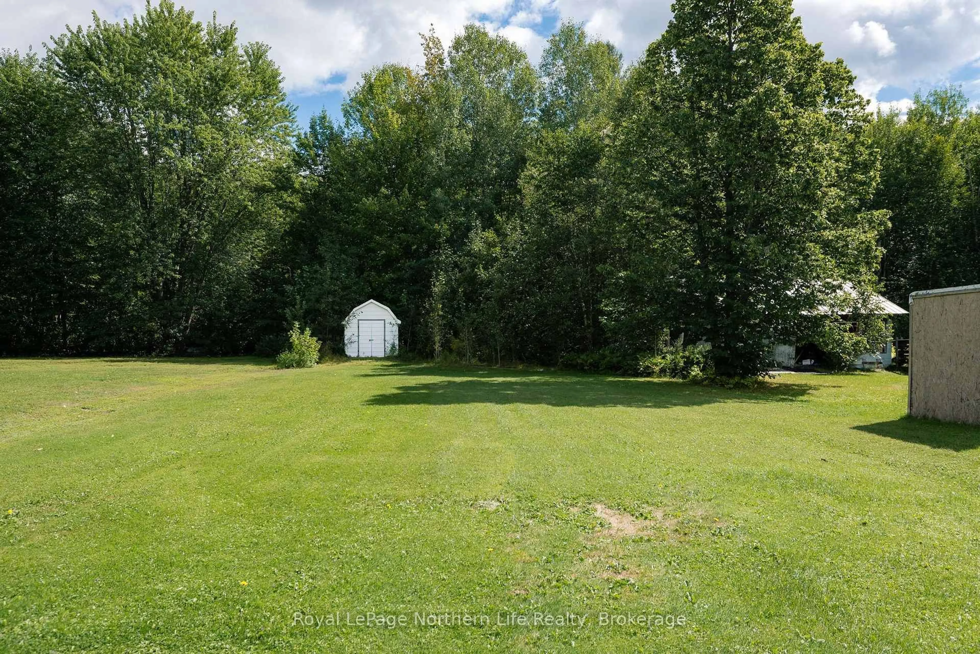 A pic from outside/outdoor area/front of a property/back of a property/a pic from drone, forest/trees view for 378 Nipissing St, West Nipissing Ontario P2B 3E2
