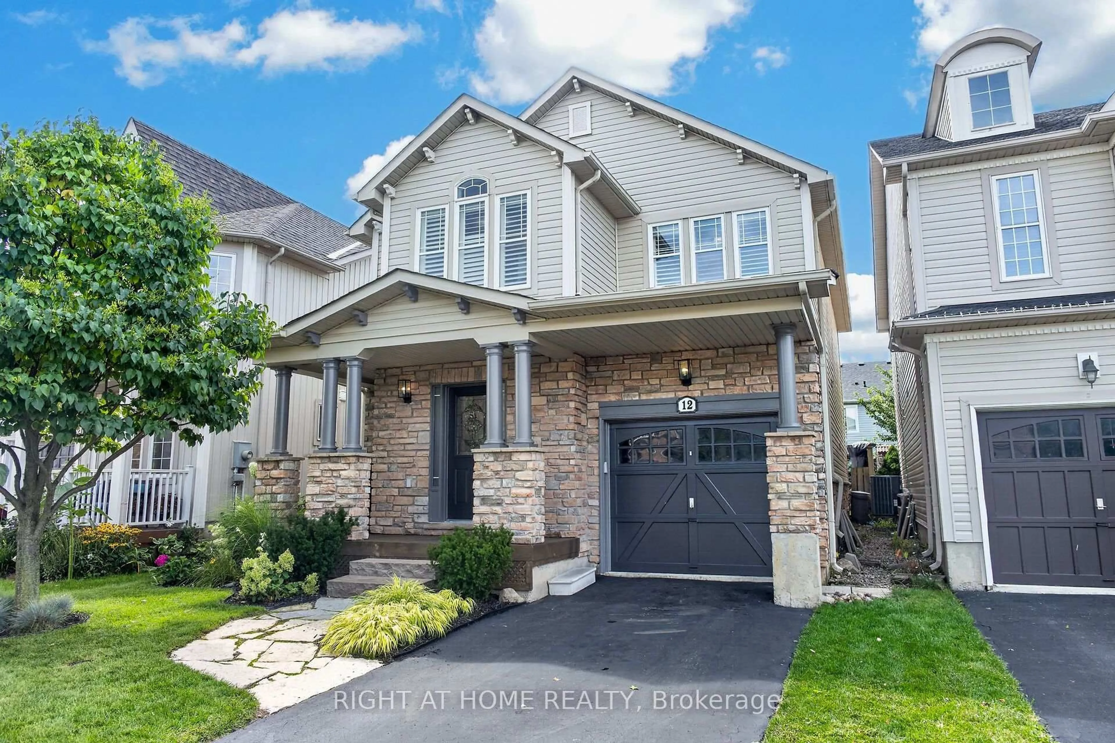 Home with brick exterior material, street for 12 Fiddlehead Cres, Hamilton Ontario L8B 0X8