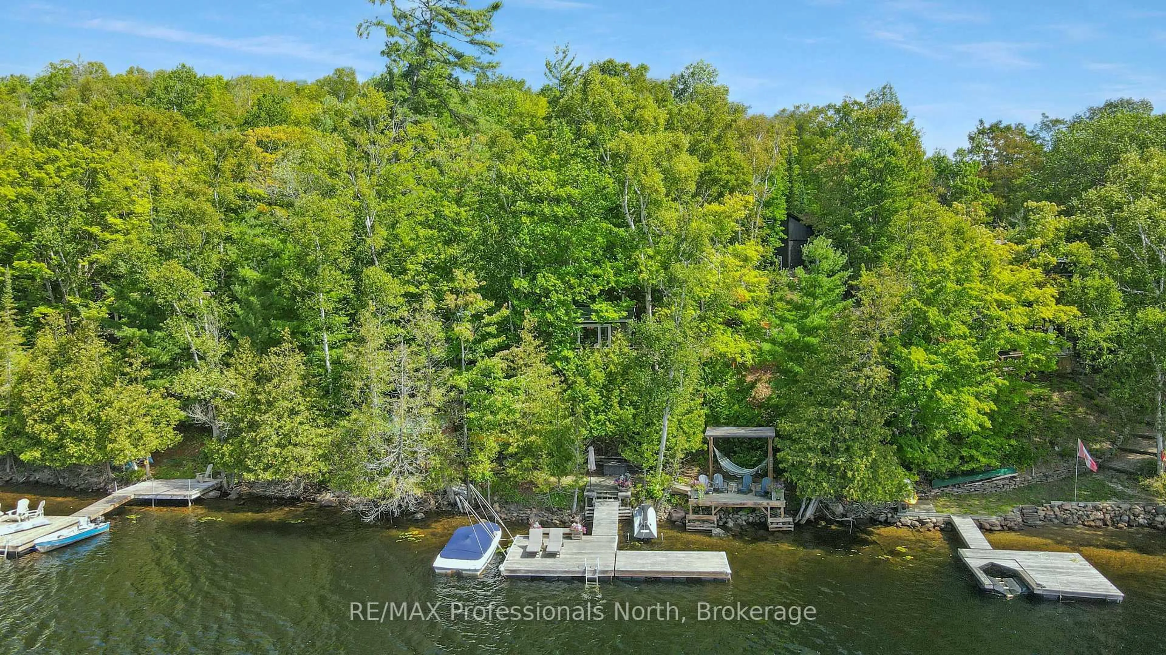 A pic from outside/outdoor area/front of a property/back of a property/a pic from drone, water/lake/river/ocean view for 1236 Poverty Bay Tr, Minden Hills Ontario K0M 2K0