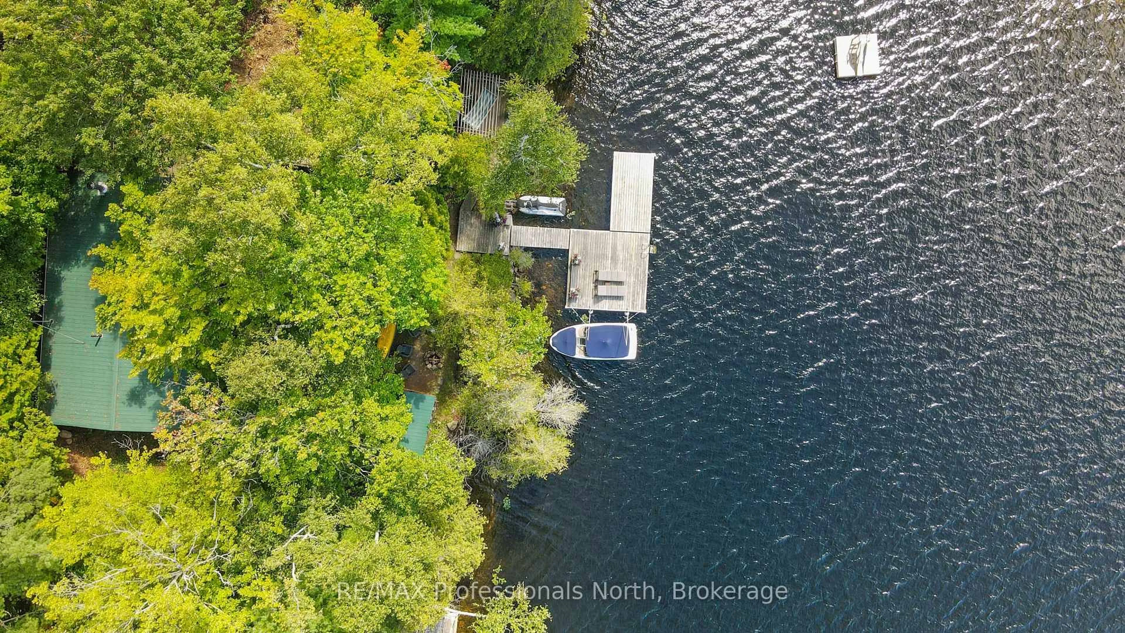 A pic from outside/outdoor area/front of a property/back of a property/a pic from drone, water/lake/river/ocean view for 1236 Poverty Bay Tr, Minden Hills Ontario K0M 2K0